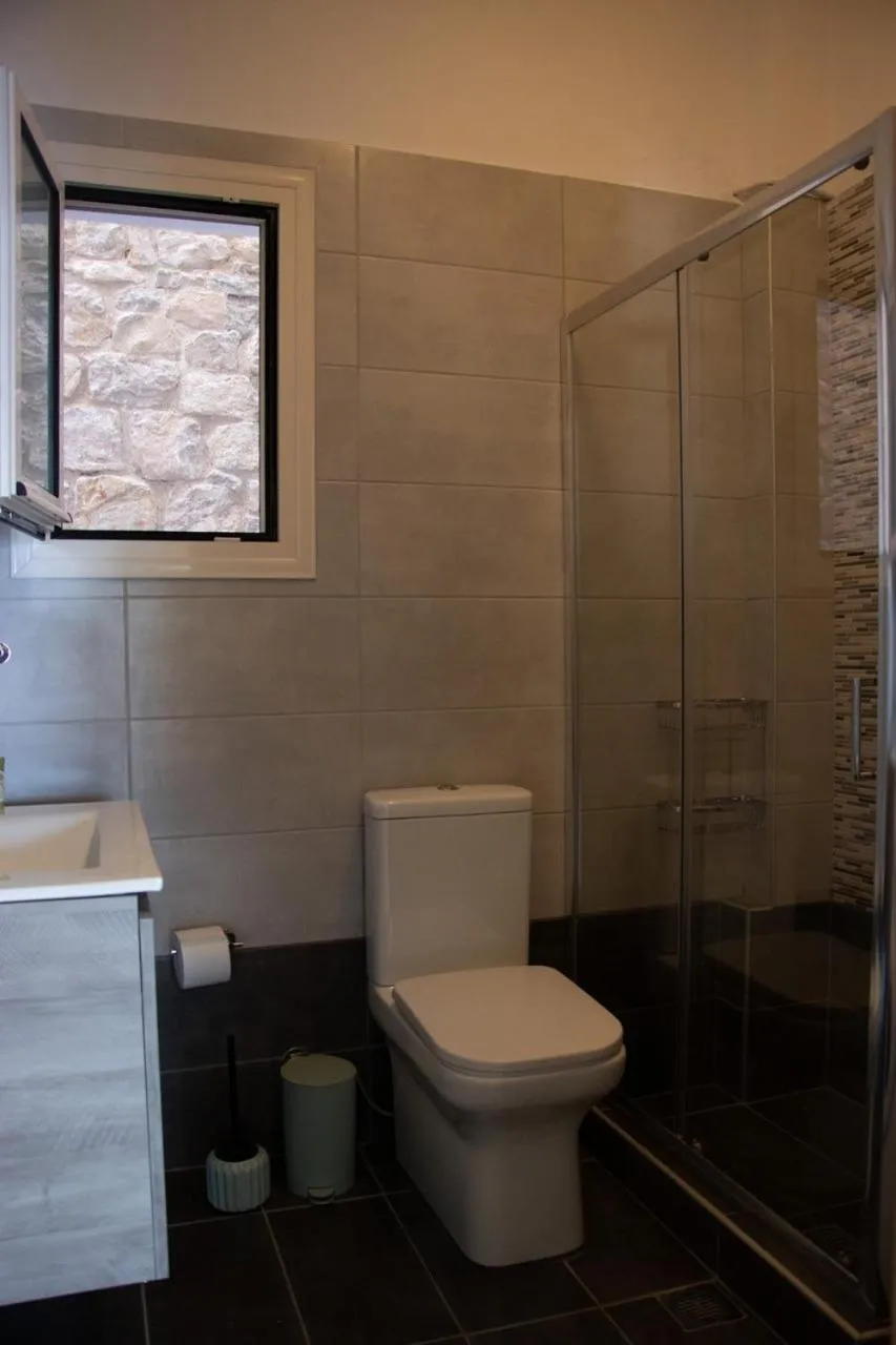 Bathroom in Grand Bleu Apartments & Villas