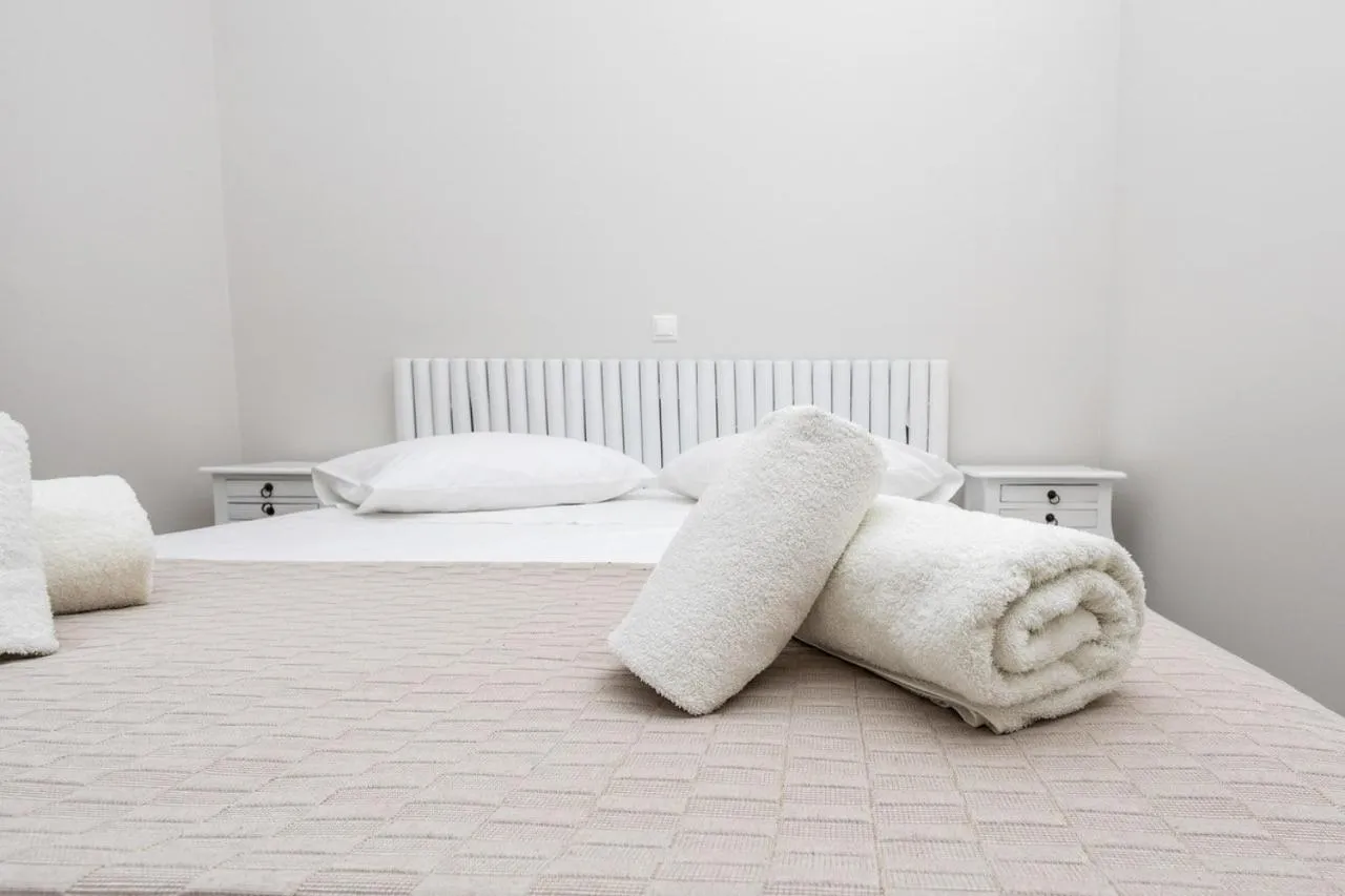 Bed in Grand Bleu Apartments & Villas