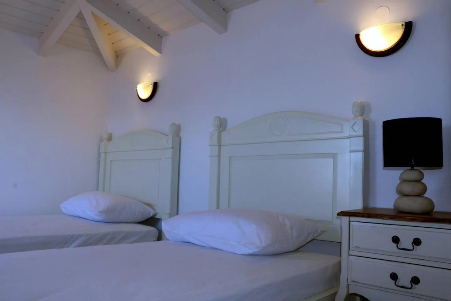 Bed in Grand Bleu Apartments & Villas