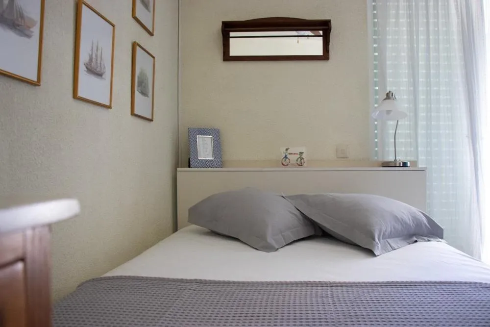 Bedroom, Bed in Grand Bleu Apartments & Villas