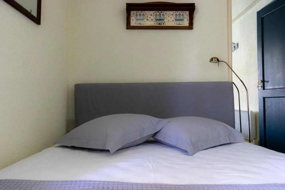 Bedroom, Bed in Grand Bleu Apartments & Villas