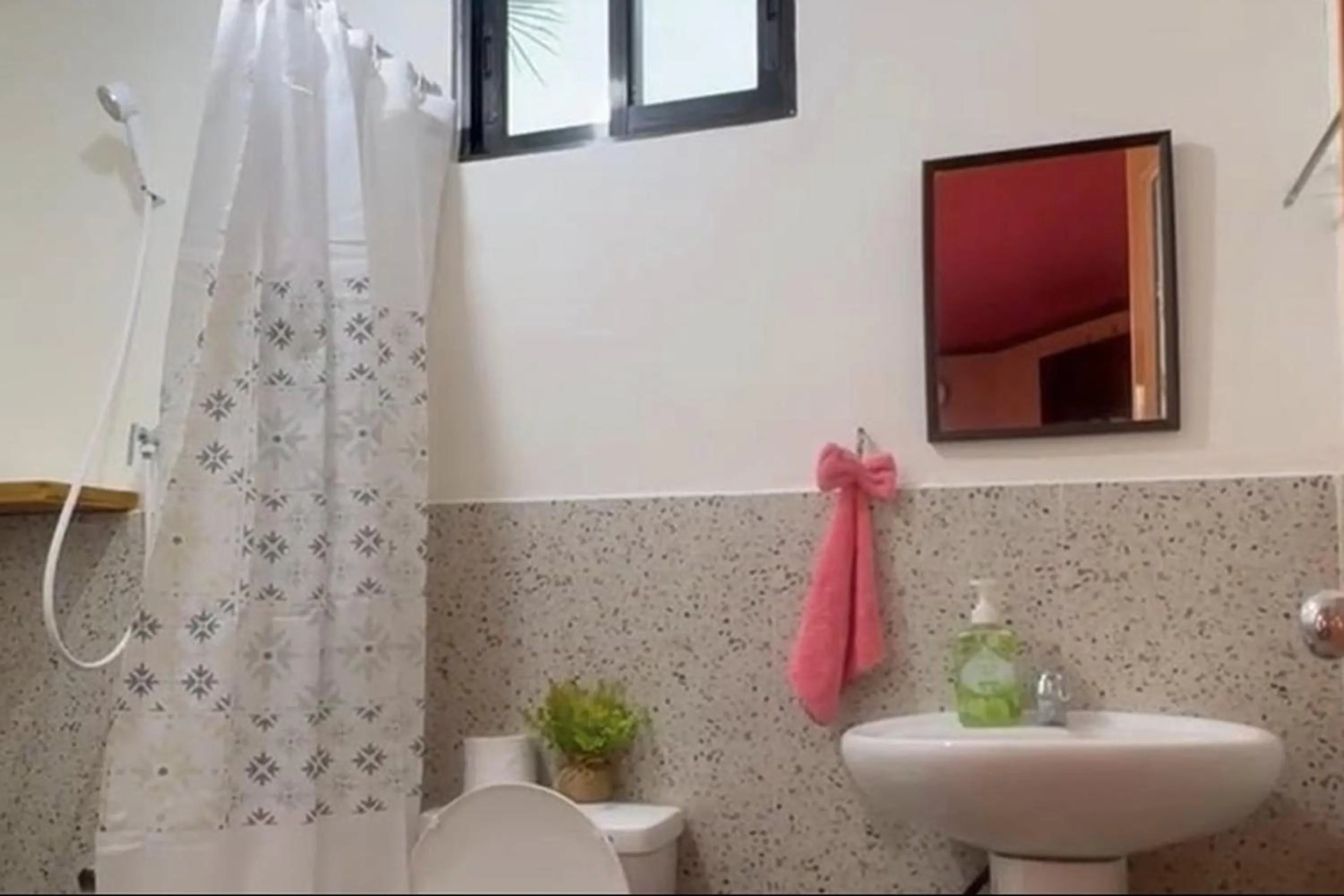 Bathroom in ADRIANA's PLACE TROPICAL GUESTHOUSE