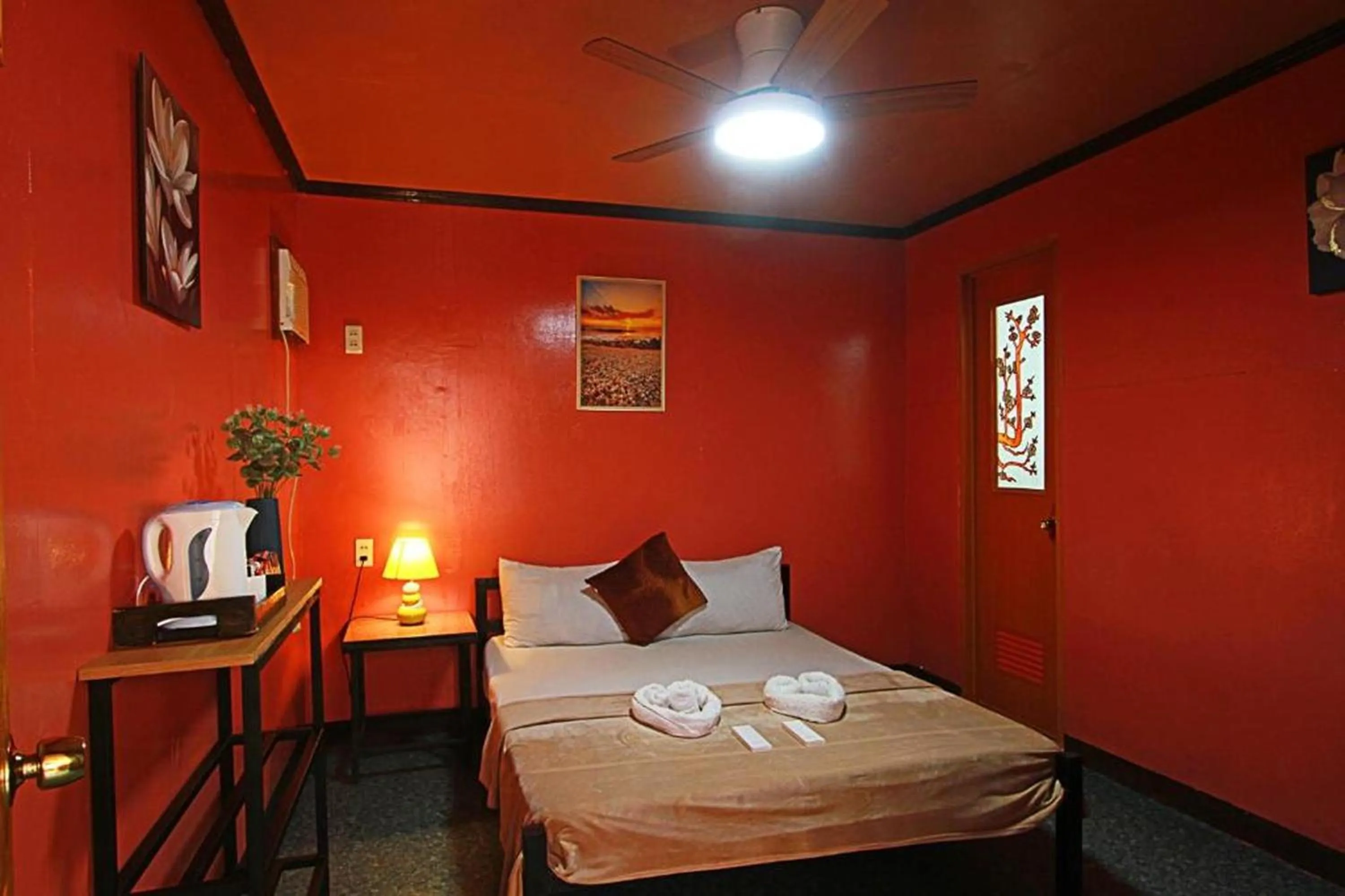 Photo of the whole room, Bed in ADRIANA's PLACE TROPICAL GUESTHOUSE