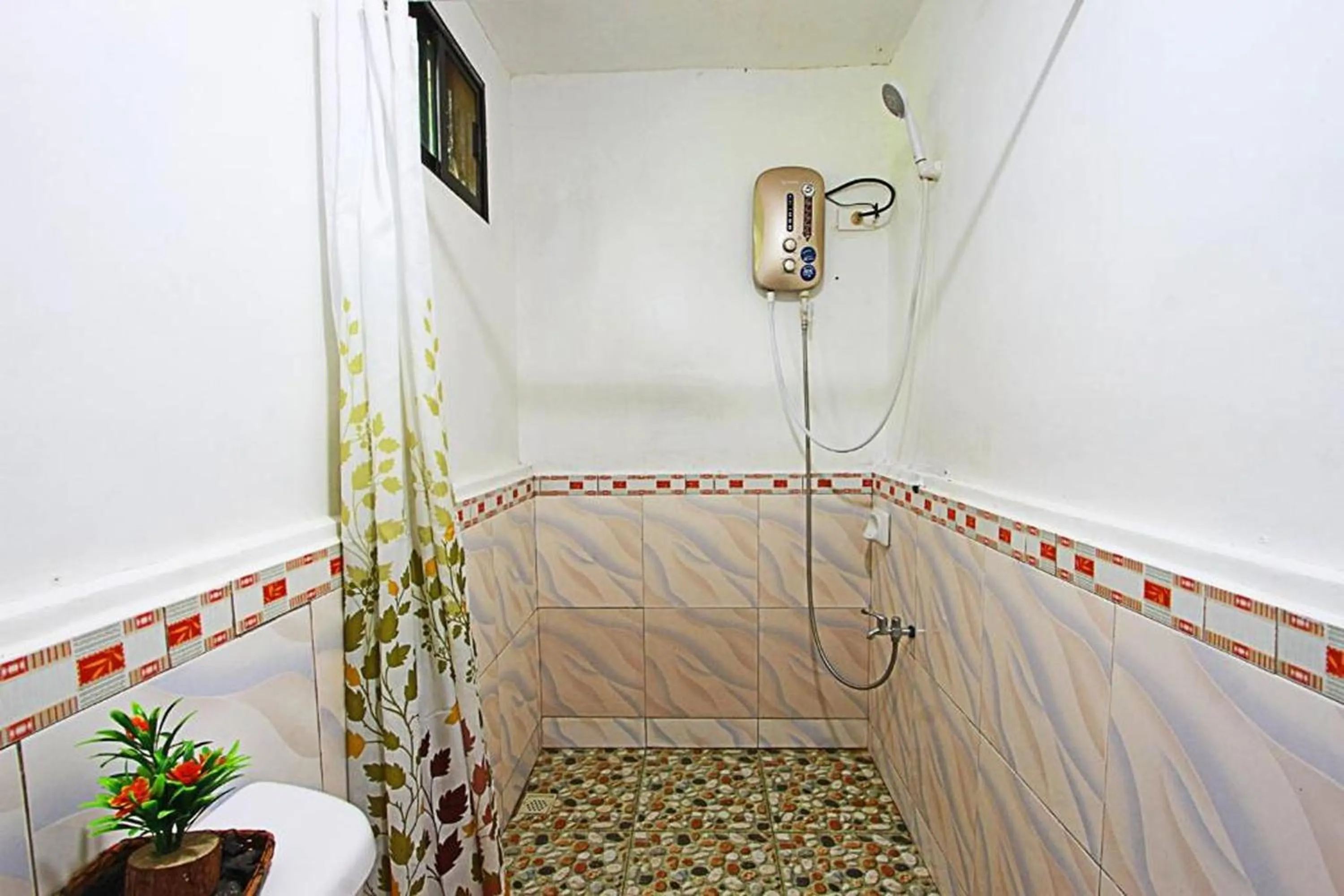 Bathroom in ADRIANA's PLACE TROPICAL GUESTHOUSE