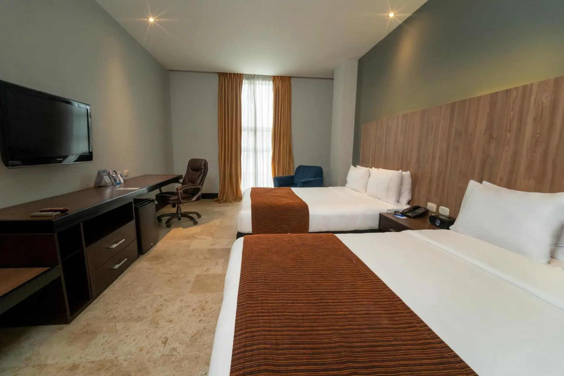 Photo of the whole room, Bed in GHL Hotel Barranquilla