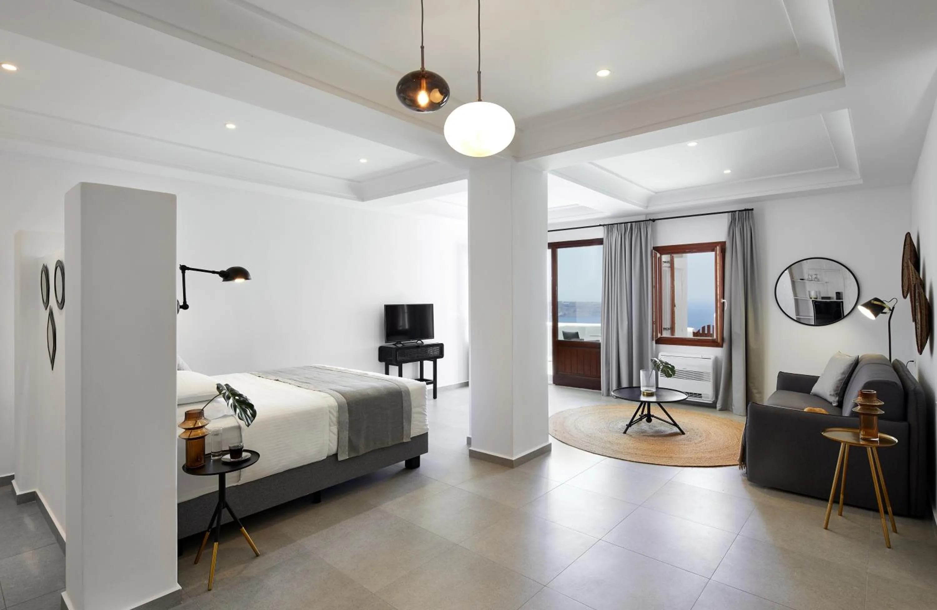 Bed in Petit Palace Suites