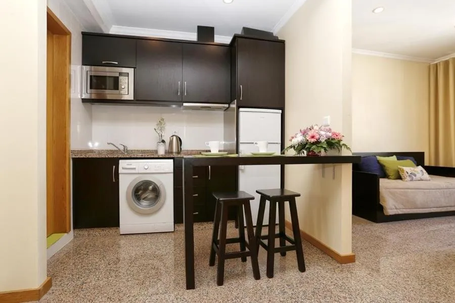 Kitchen or kitchenette in Oporto City Centre Apartments