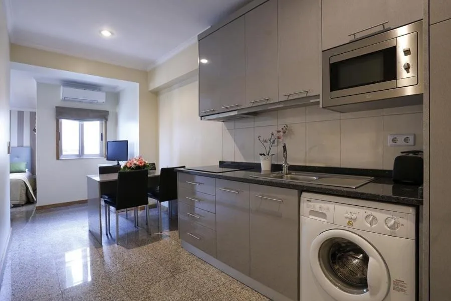 Kitchen or kitchenette in Oporto City Centre Apartments