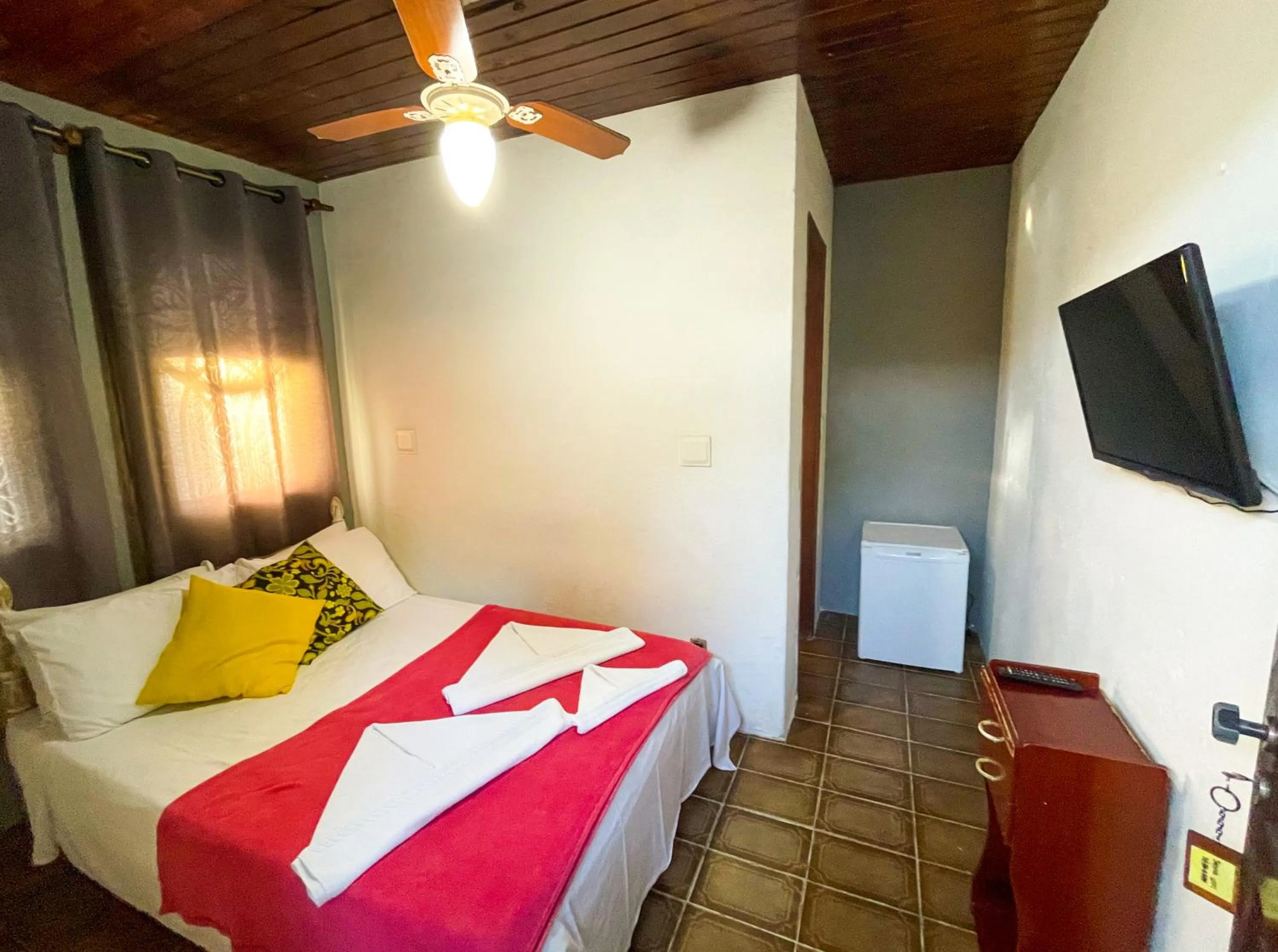 Bed in Pousada Chale Suísso