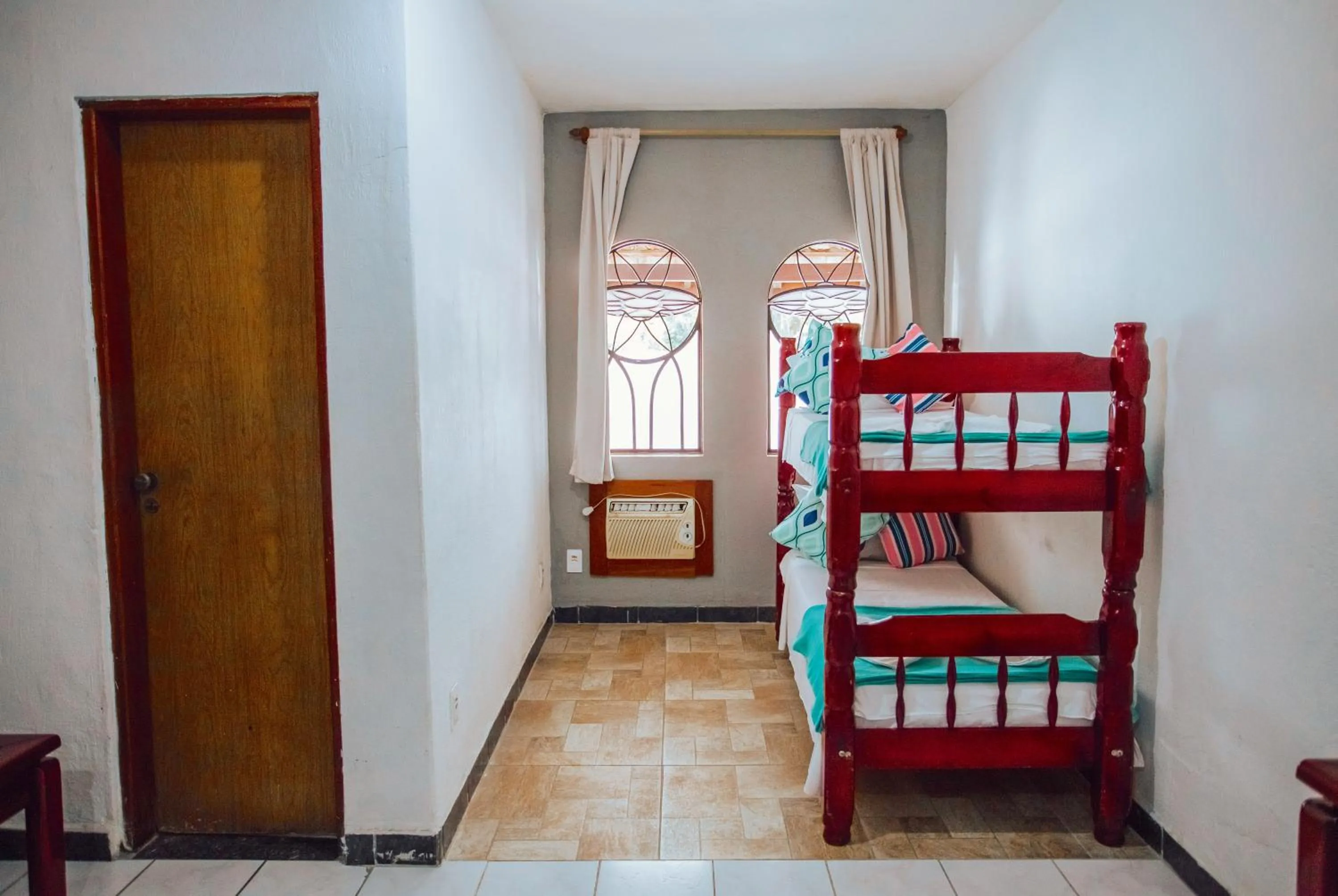 Bed in Pousada Chale Suísso