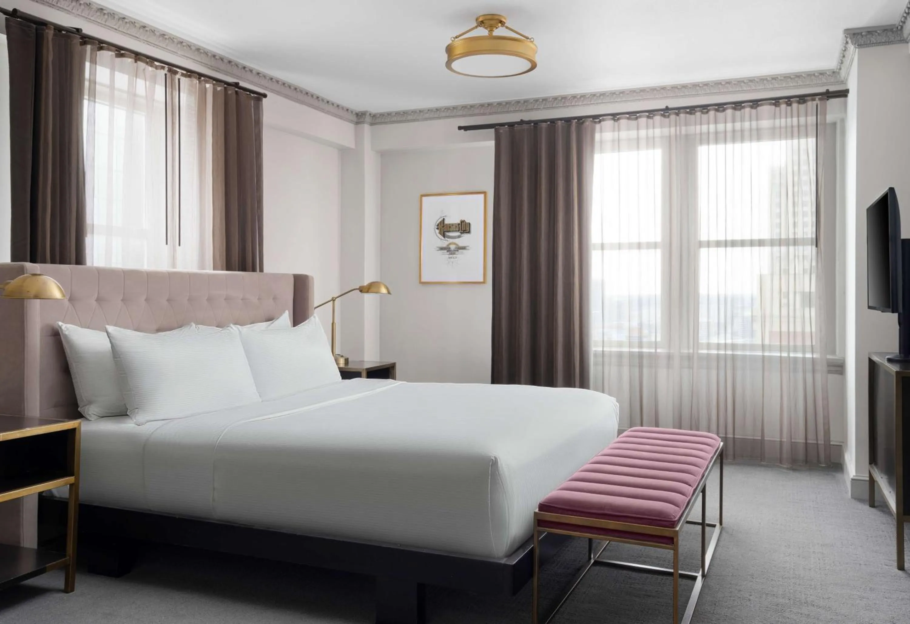 Bed in Hotel Phillips Kansas City, Curio Collection By Hilton