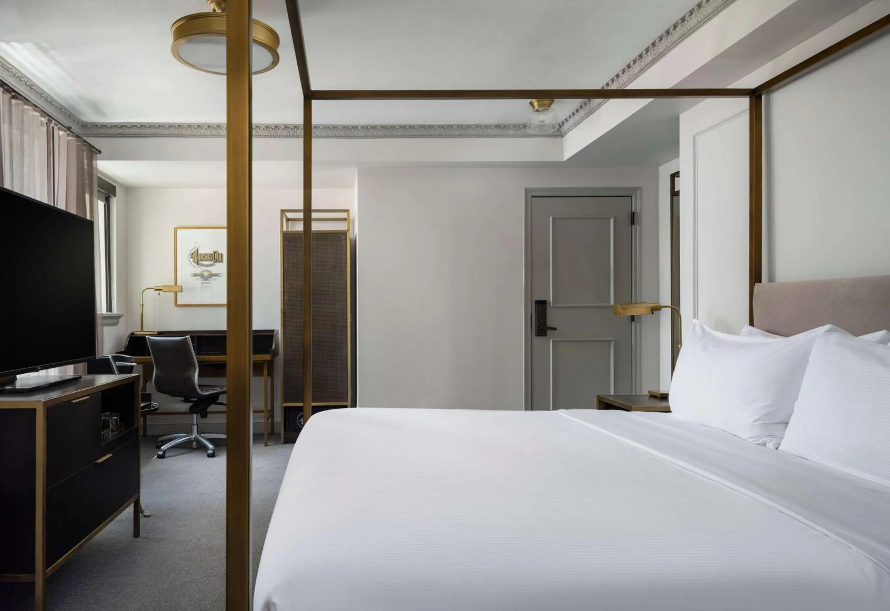 Bed in Hotel Phillips Kansas City, Curio Collection By Hilton