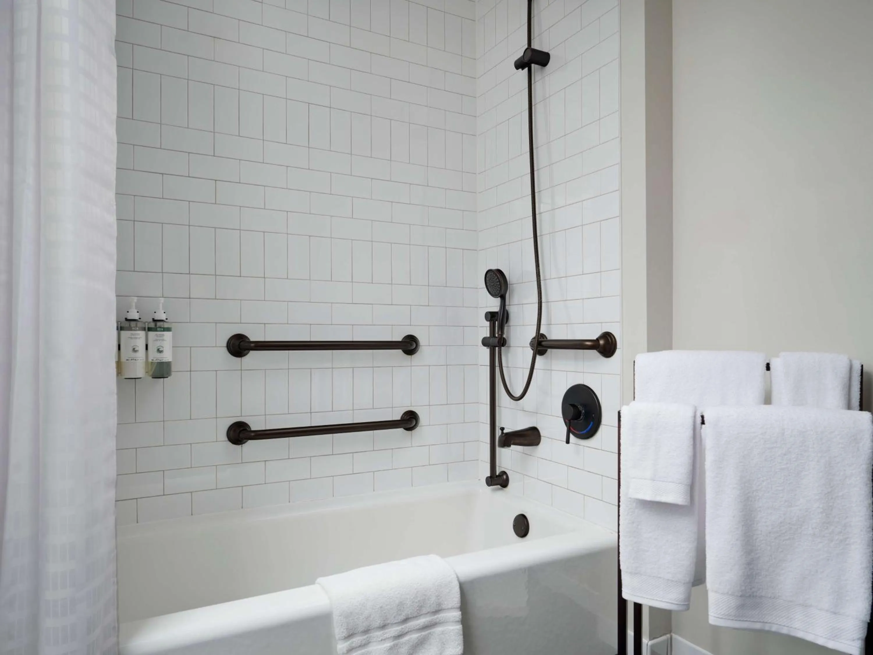 Bathroom in Hotel Phillips Kansas City, Curio Collection By Hilton