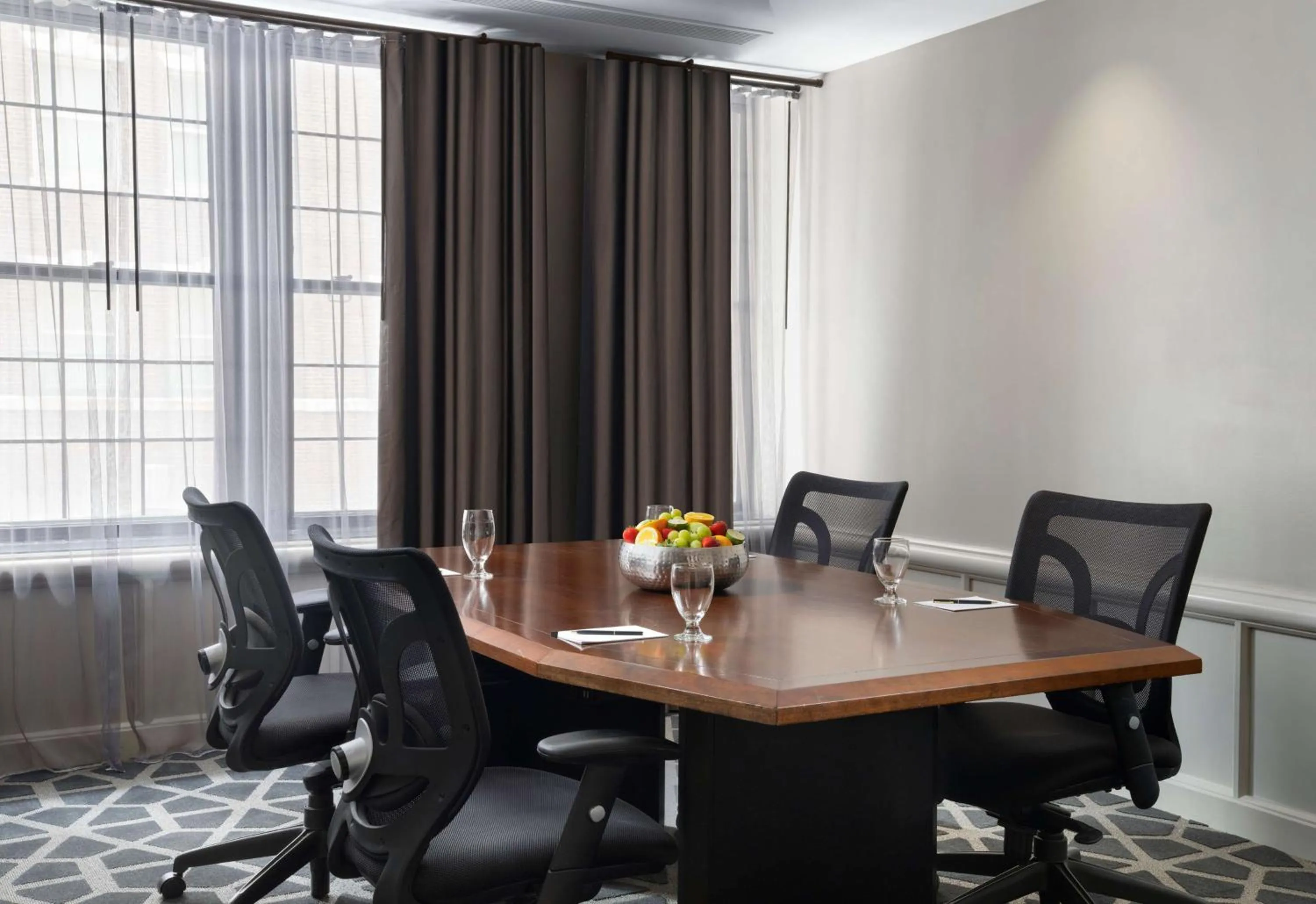 Living room in Hotel Phillips Kansas City, Curio Collection By Hilton