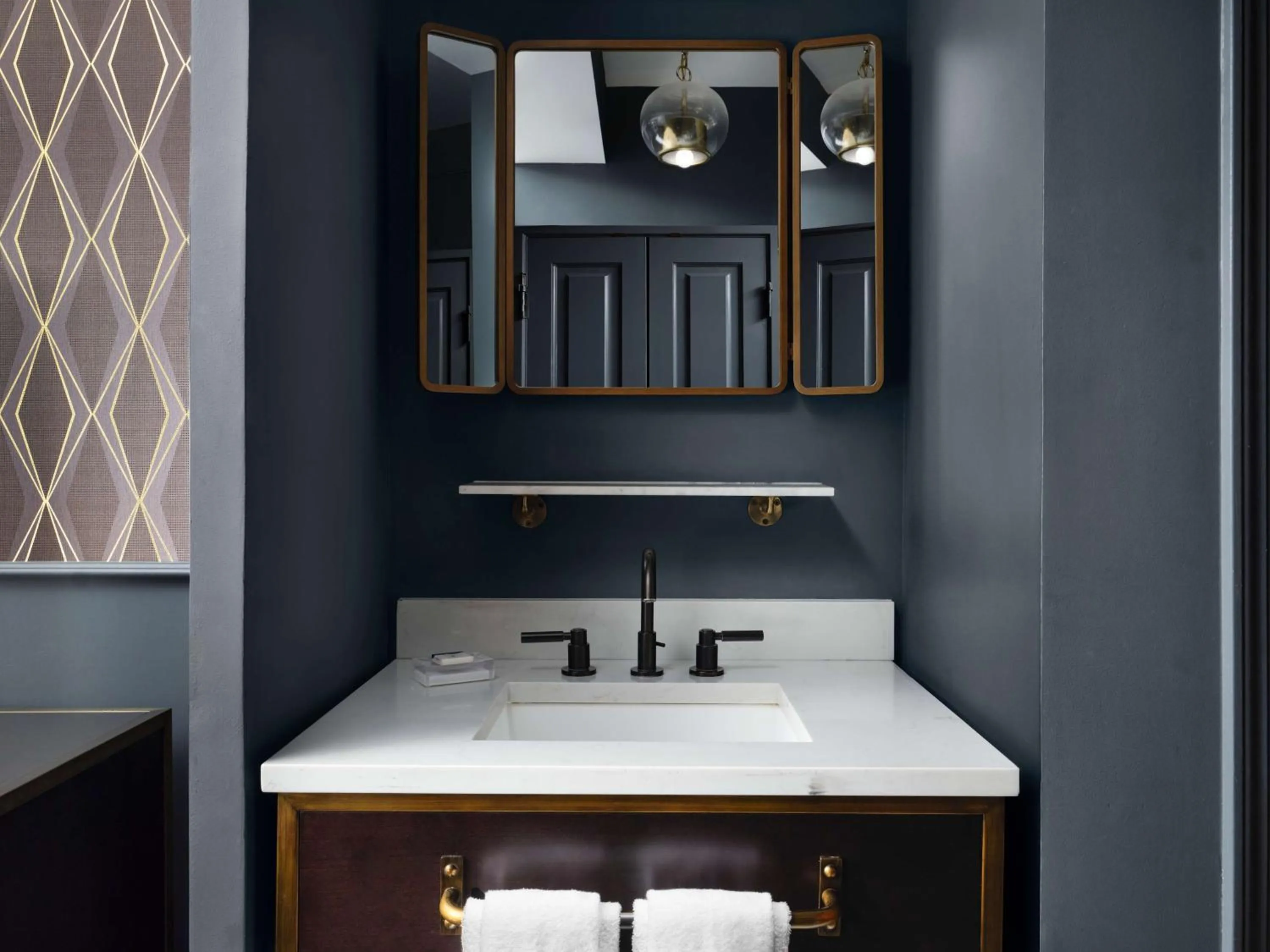 Bathroom in Hotel Phillips Kansas City, Curio Collection By Hilton