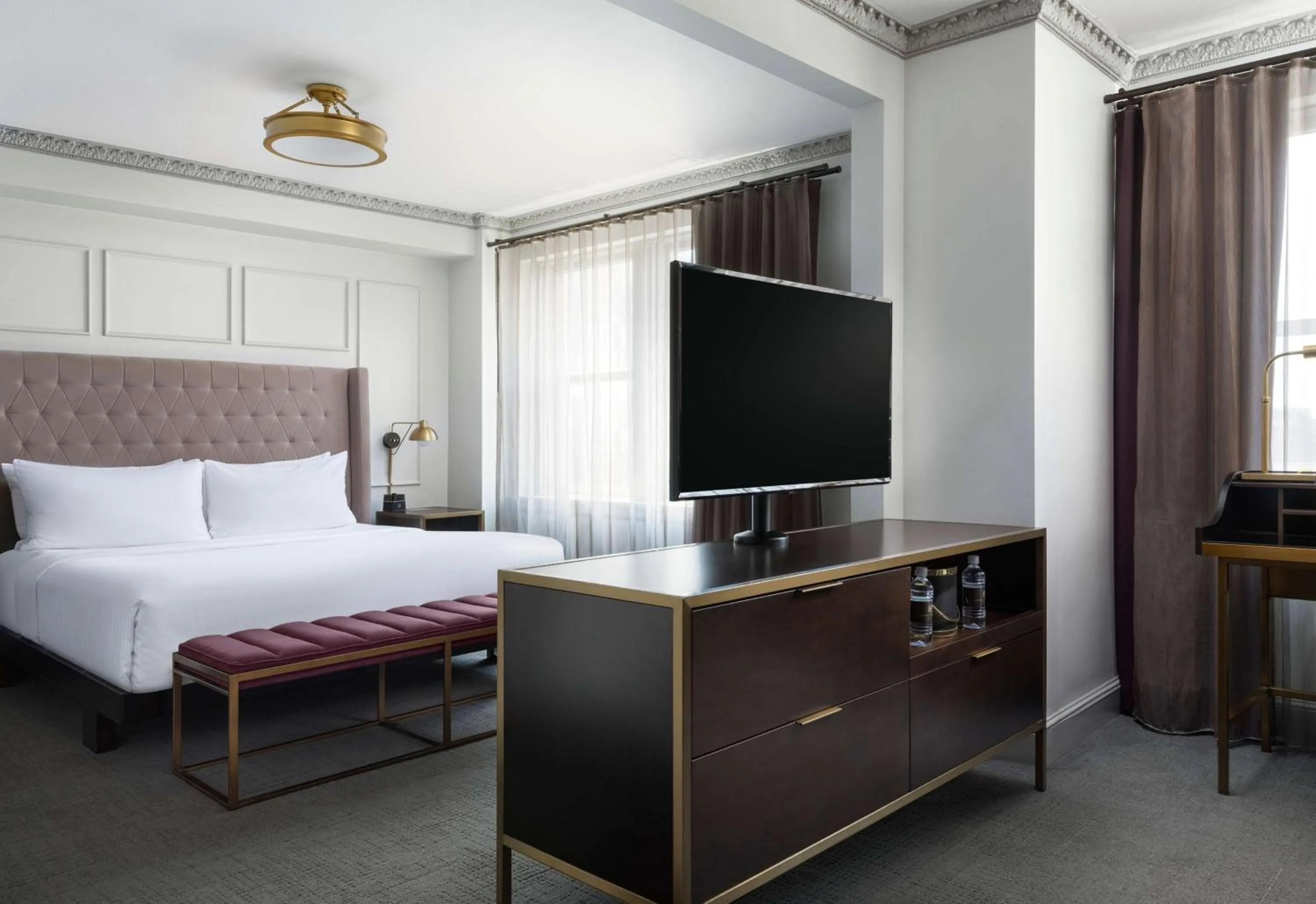 Bed in Hotel Phillips Kansas City, Curio Collection By Hilton