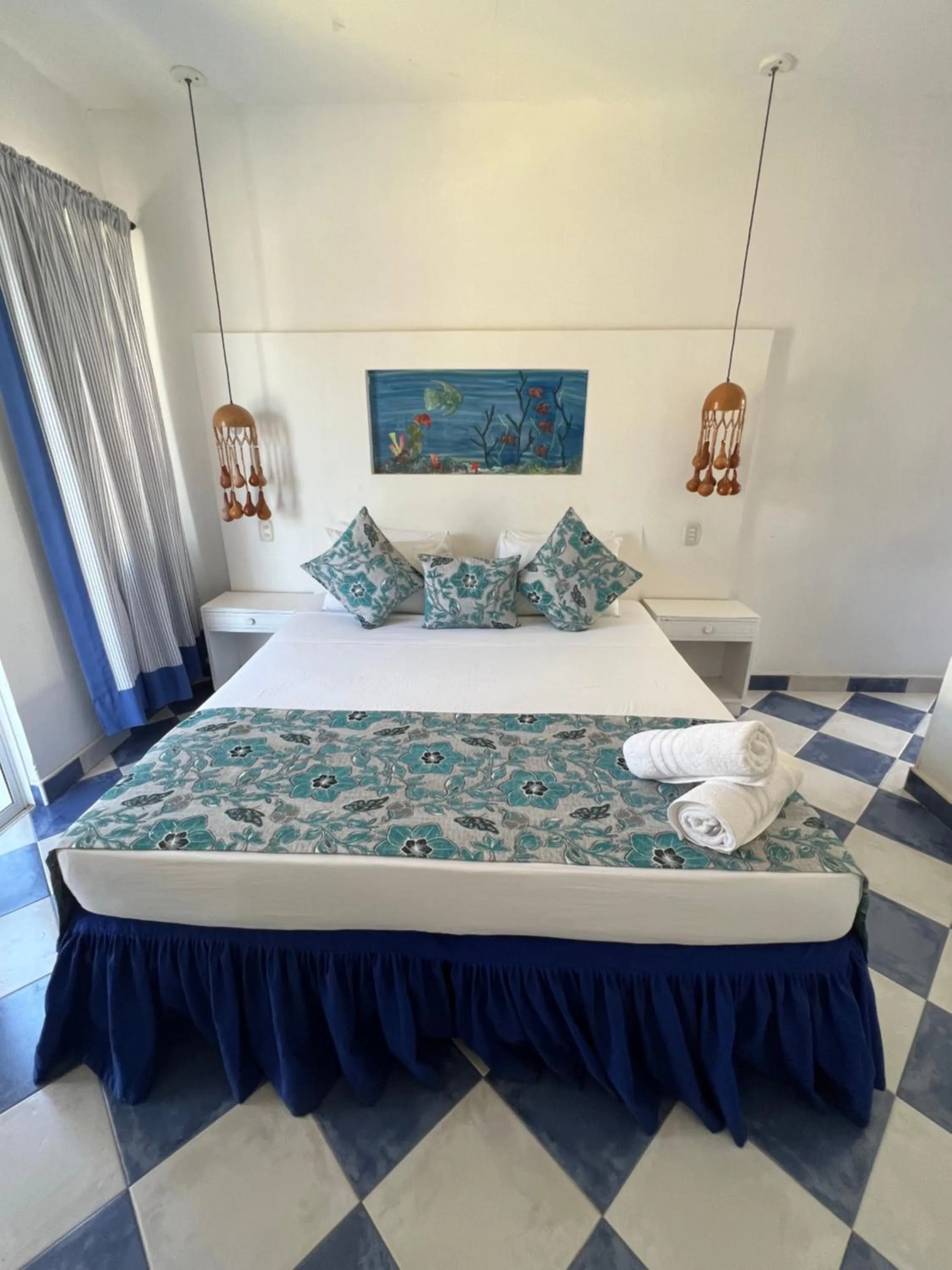 Property building, Bed in La Ballena Azul Hotel