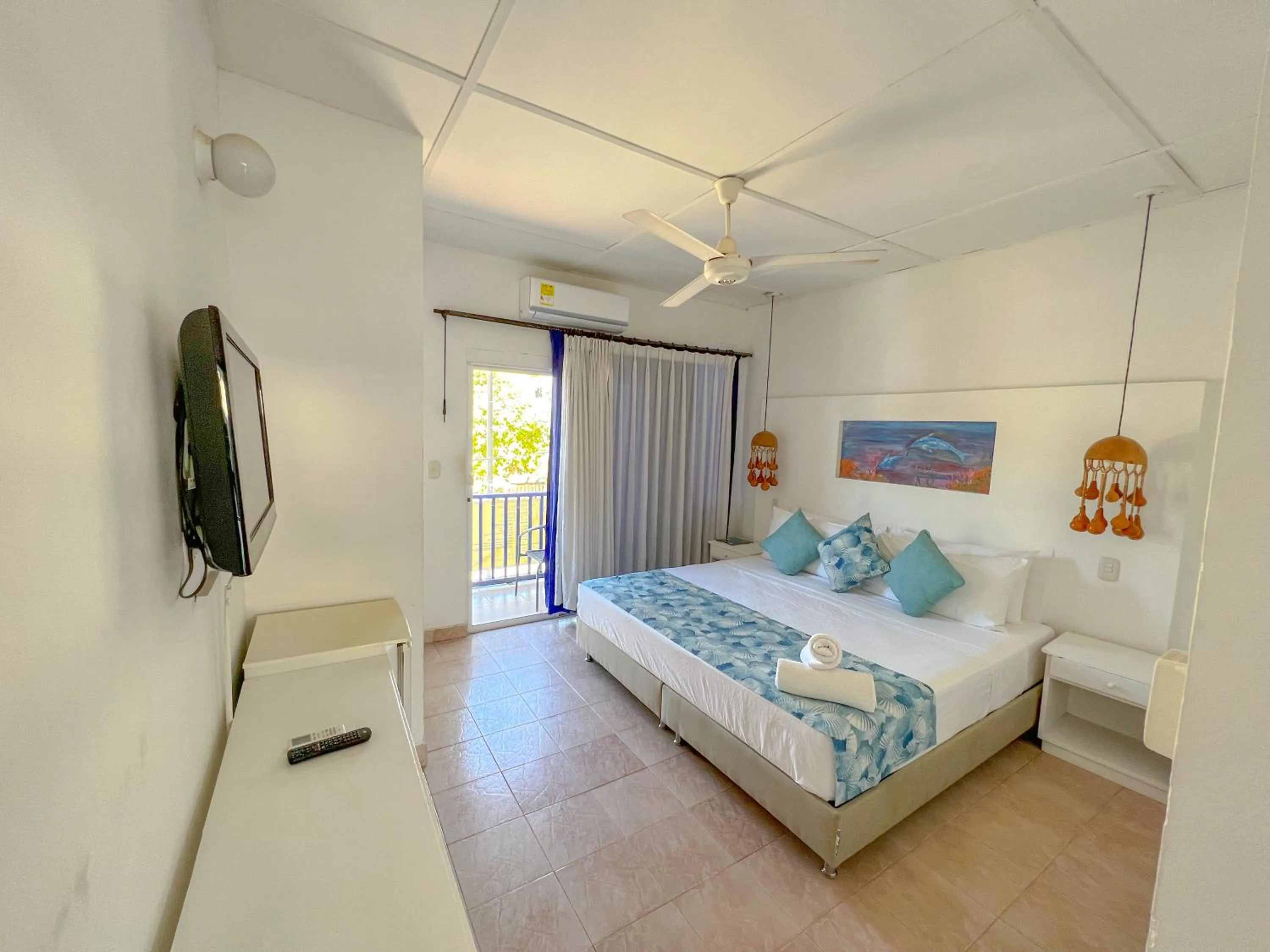 Bed in La Ballena Azul Hotel