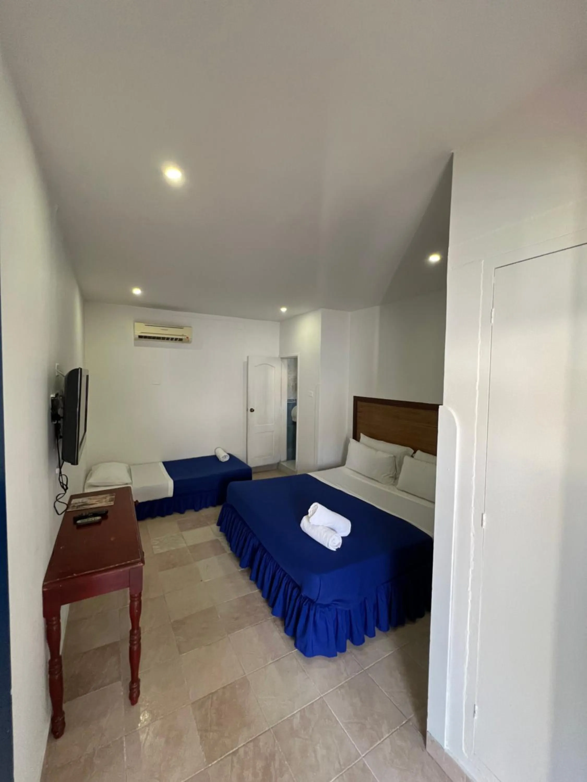 Bed in La Ballena Azul Hotel