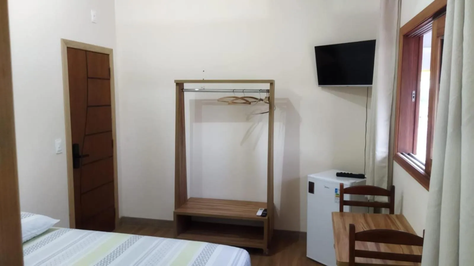 TV and multimedia, Bed in Pousada Primavera