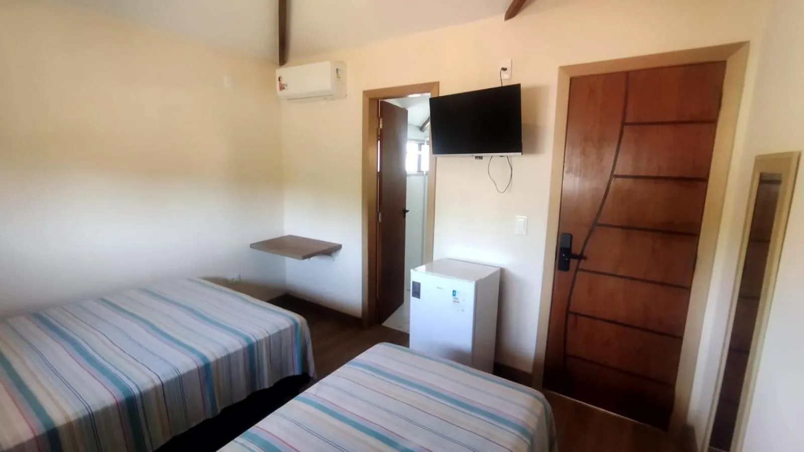 TV and multimedia, Bed in Pousada Primavera