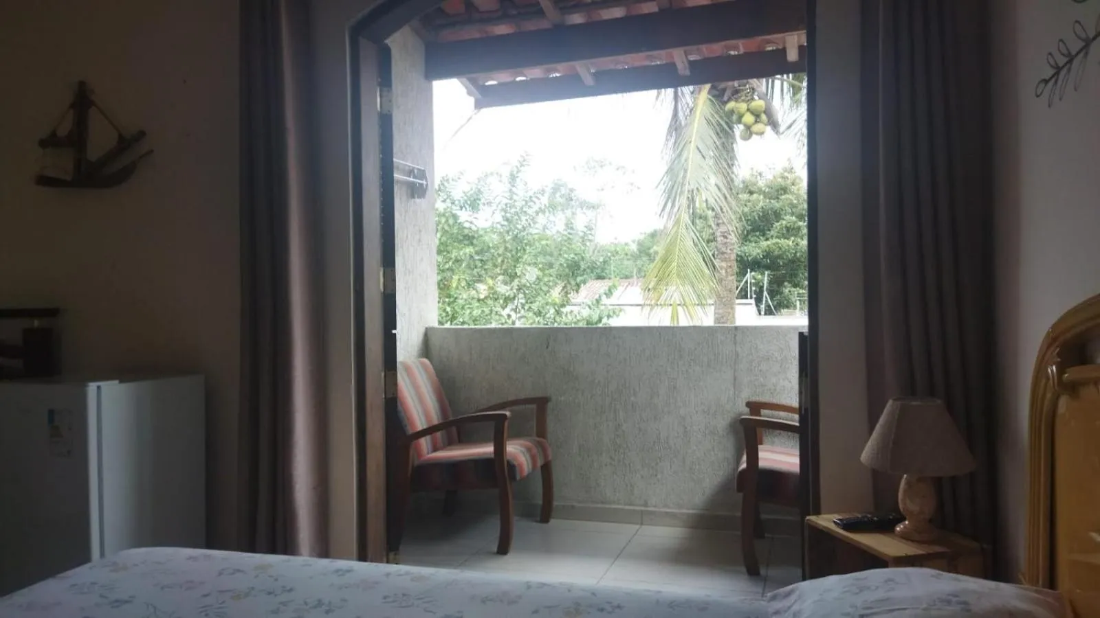 Balcony/Terrace, Bed in Pousada Primavera