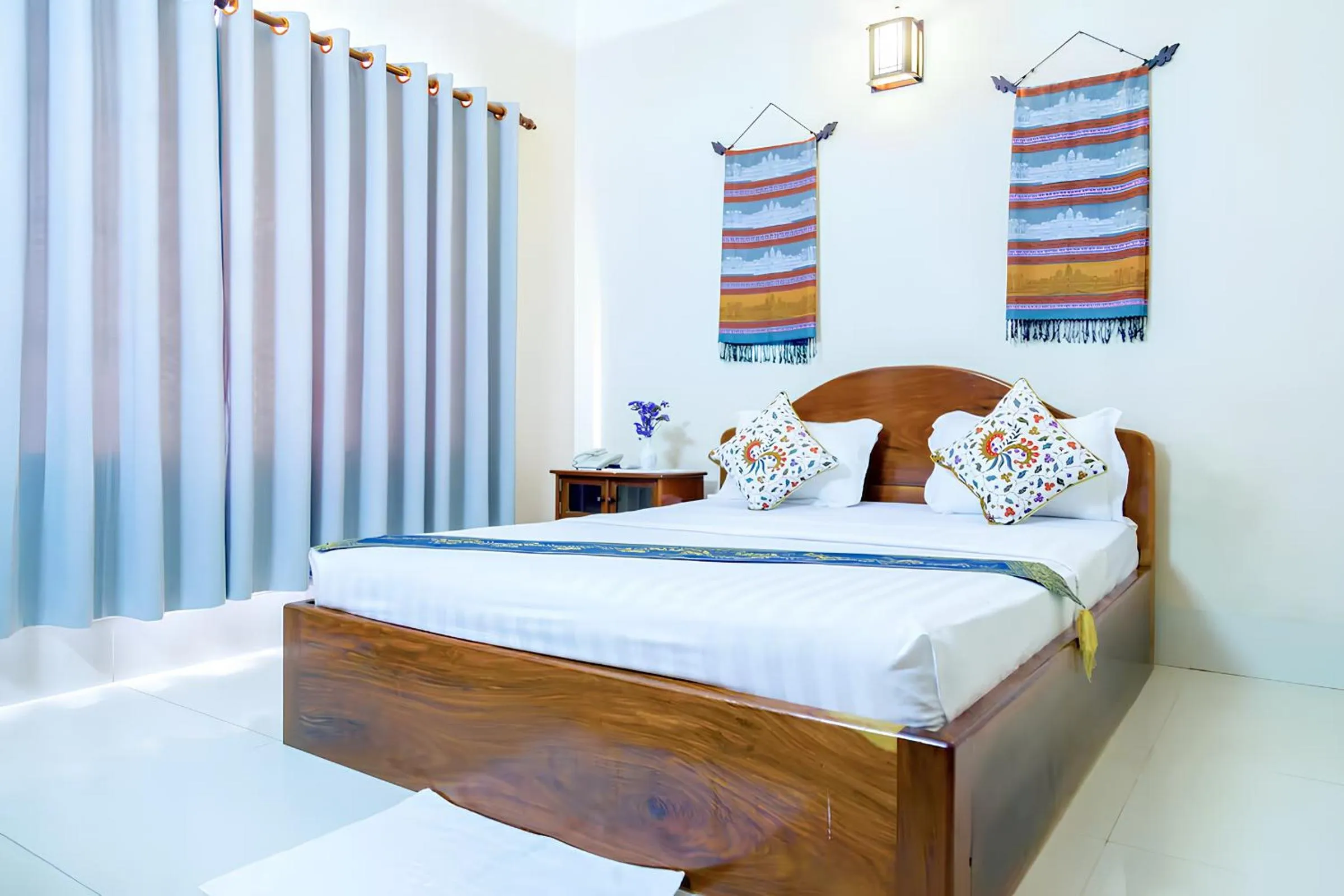 Bed in Siem Reap Riverside Hotel