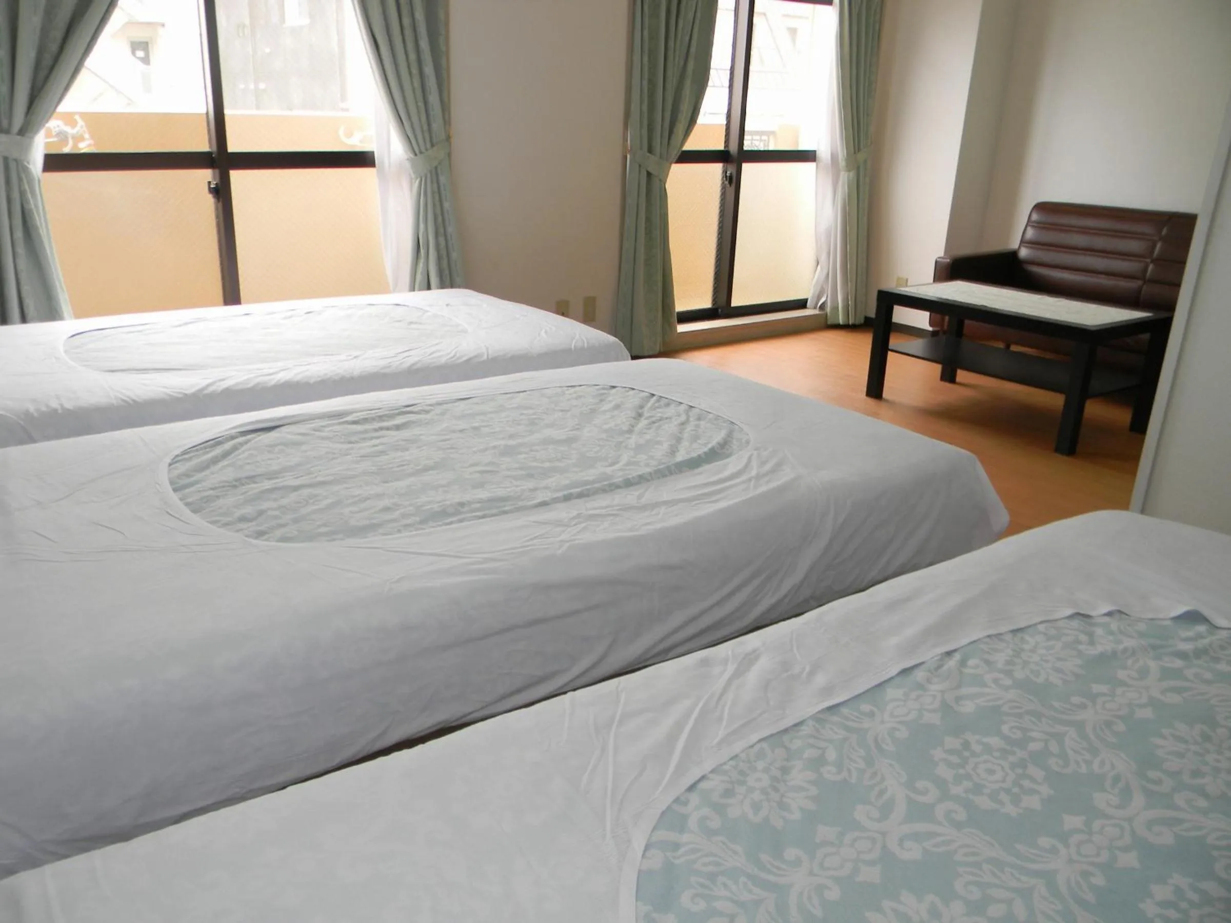 Bedroom, Bed in Weekly Green In Namba