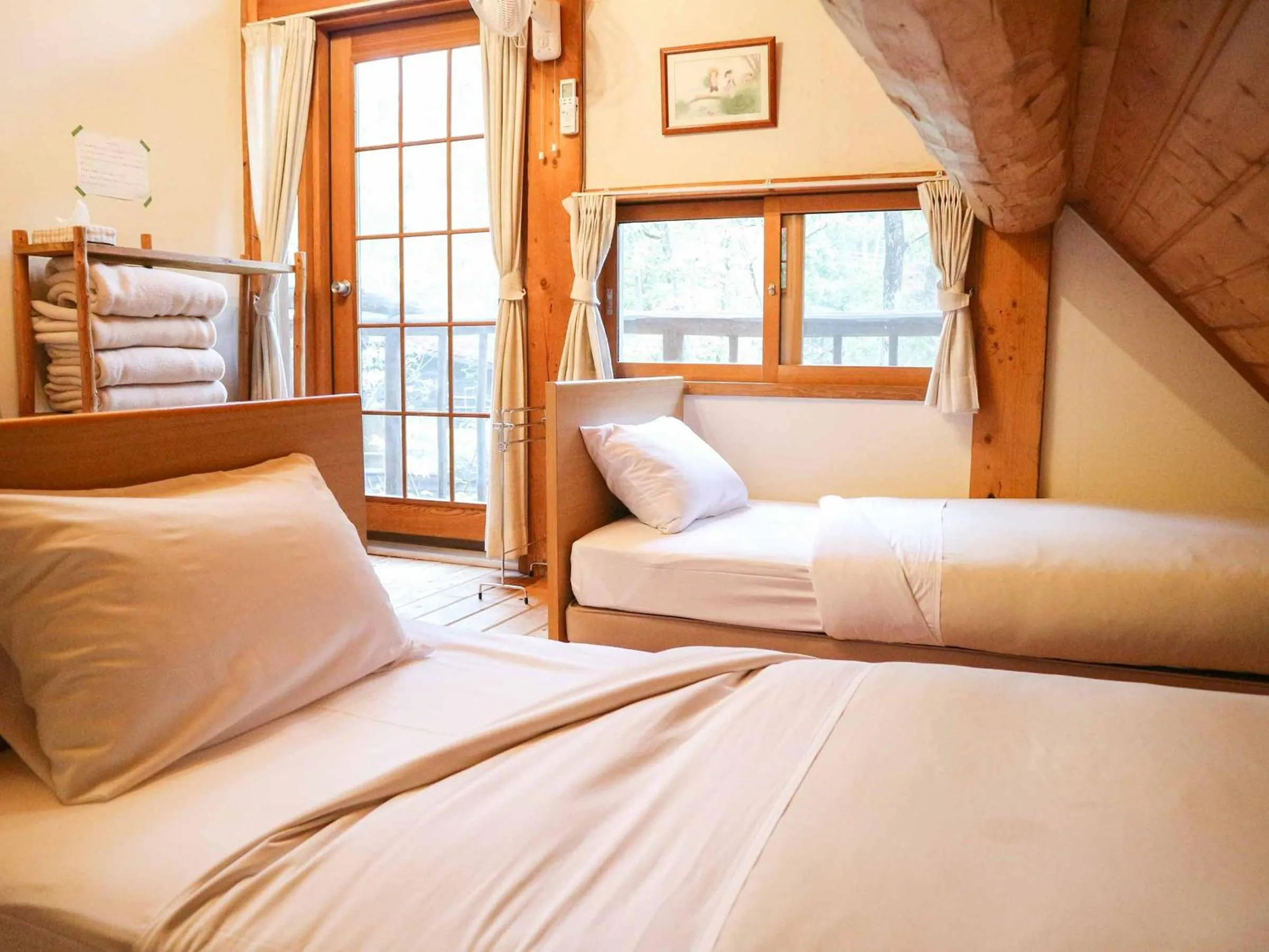 Bed in Canadian Loghouse Inn AzuminoYujin