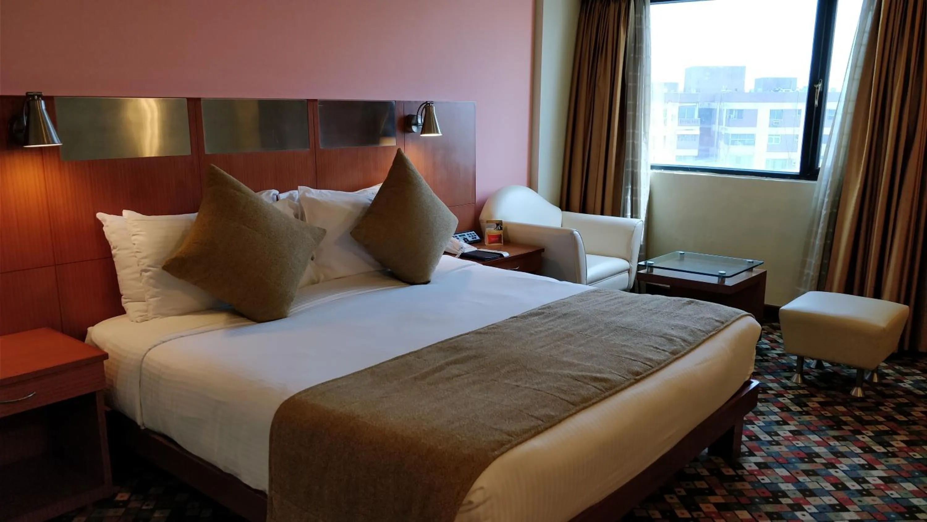 Bed in The Suryaa New Delhi