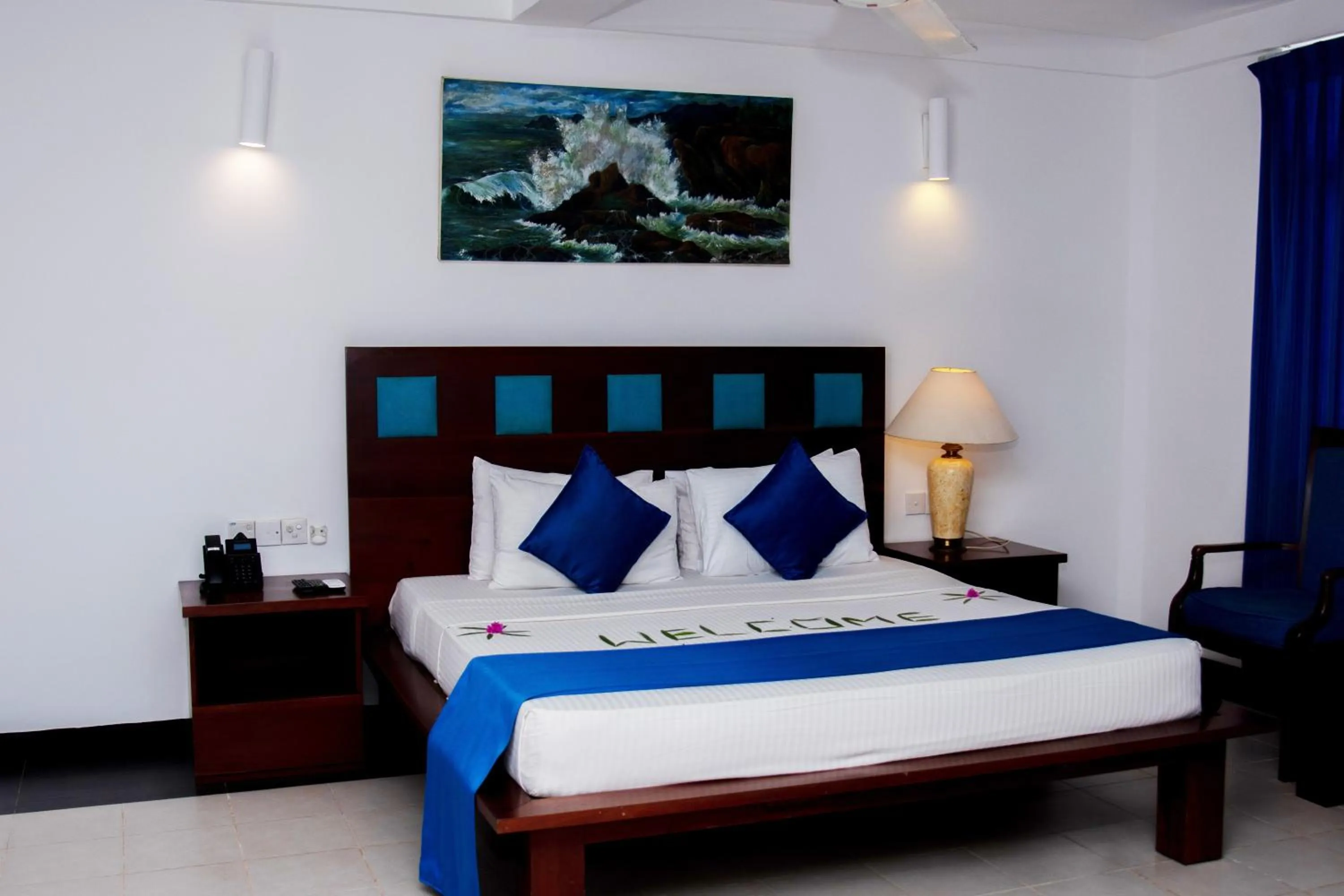 Bed in Pigeon Island Beach Resort and Spa