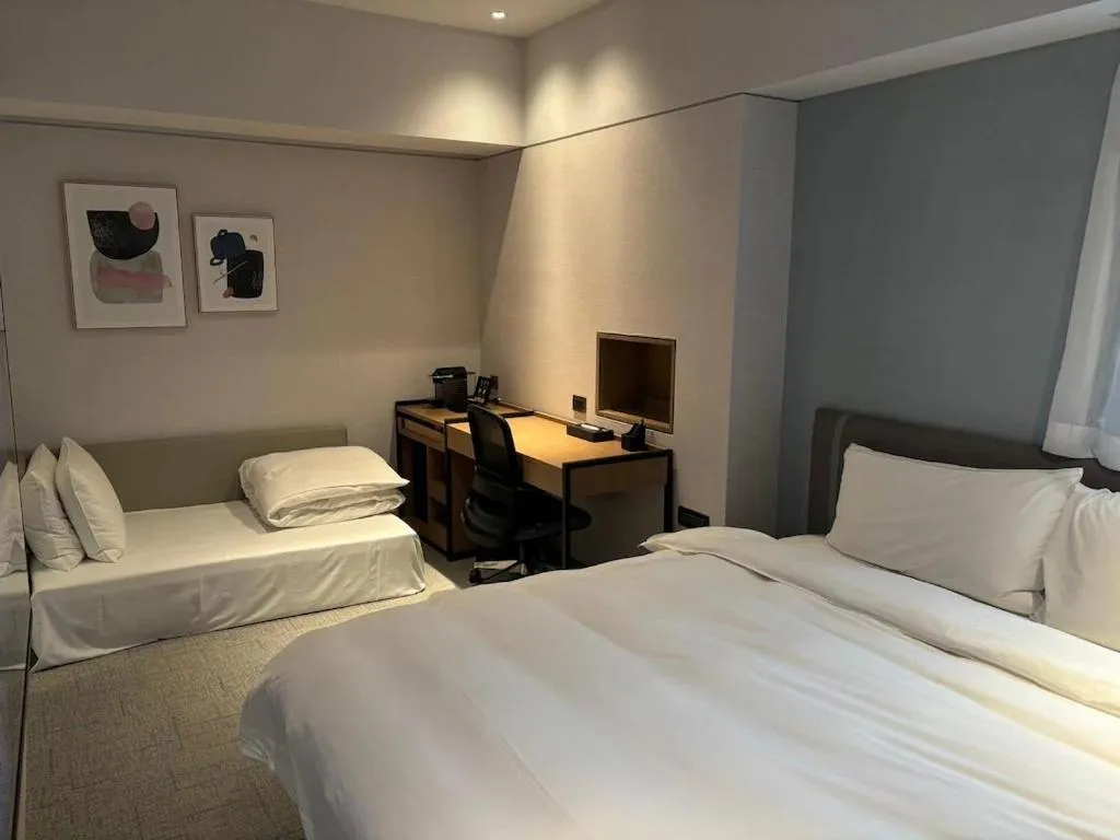 Photo of the whole room, Bed in K Hotel Taipei Nanjing