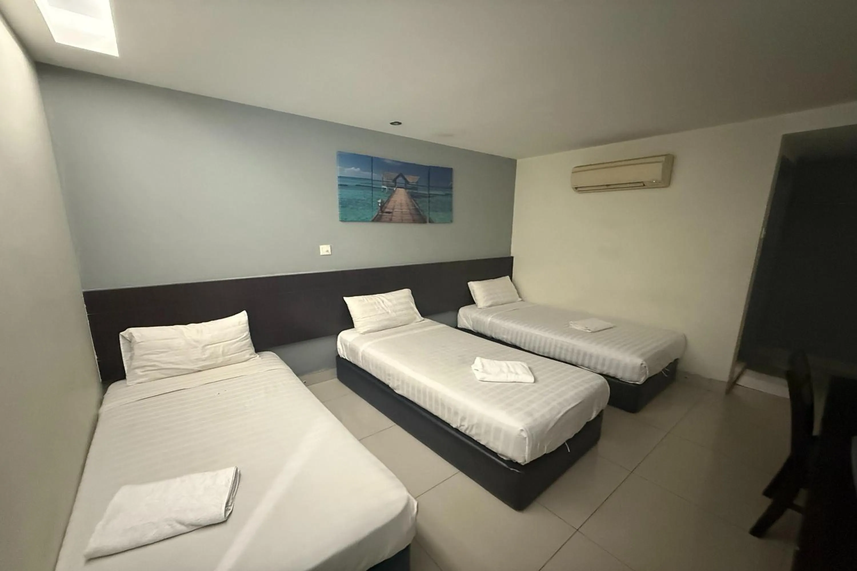 Bed in Tiong Nam Hotel