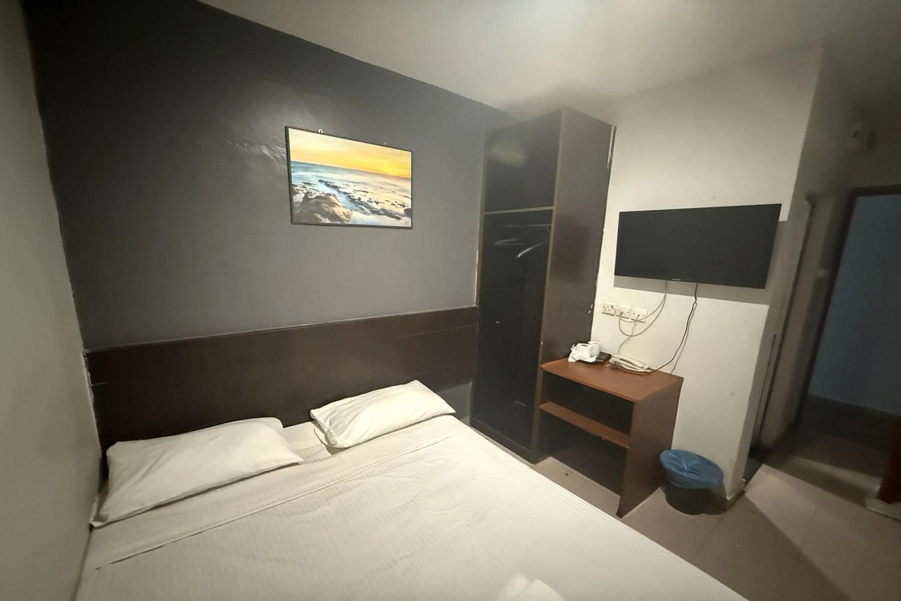 Bed in Tiong Nam Hotel