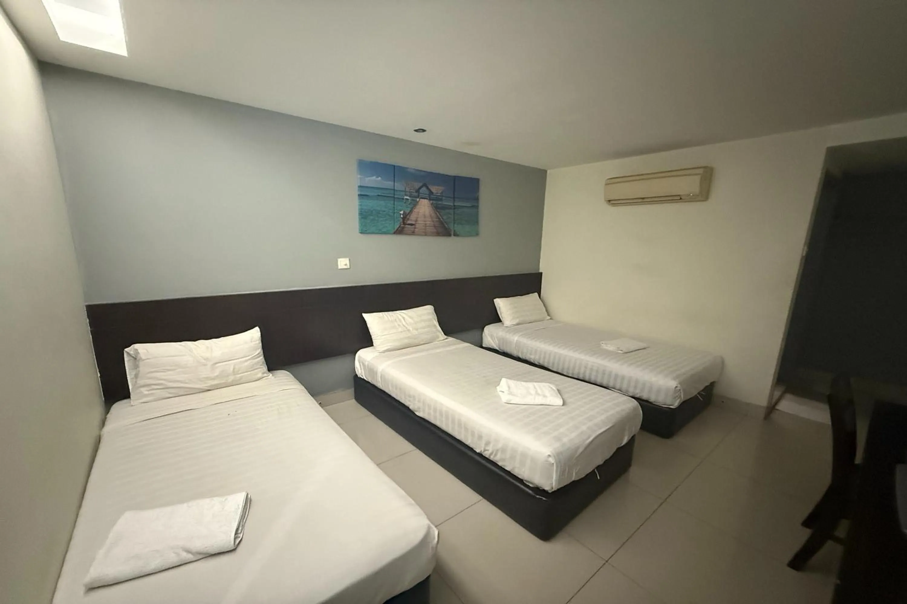 Bed in Tiong Nam Hotel