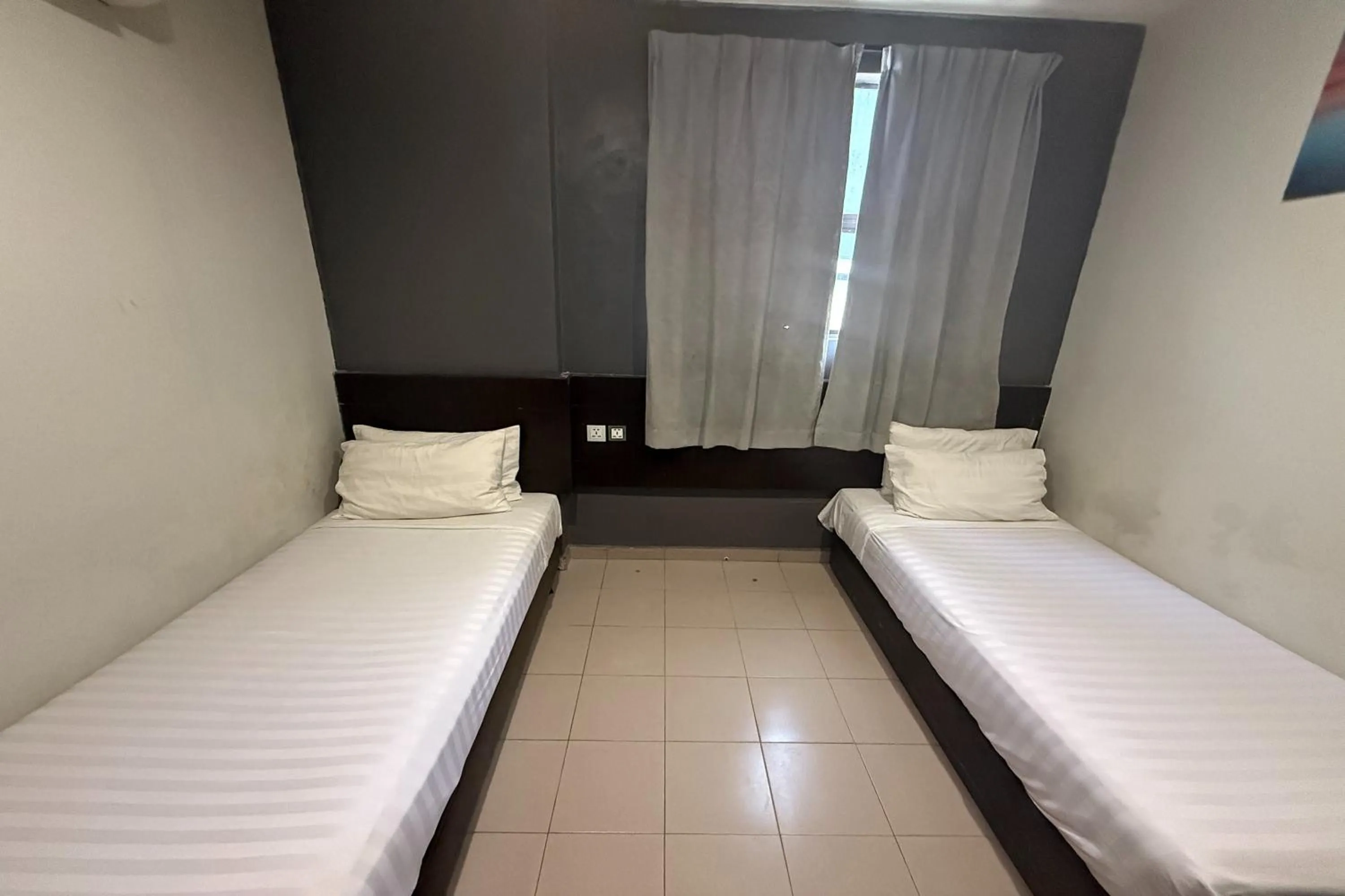 Bed in Tiong Nam Hotel