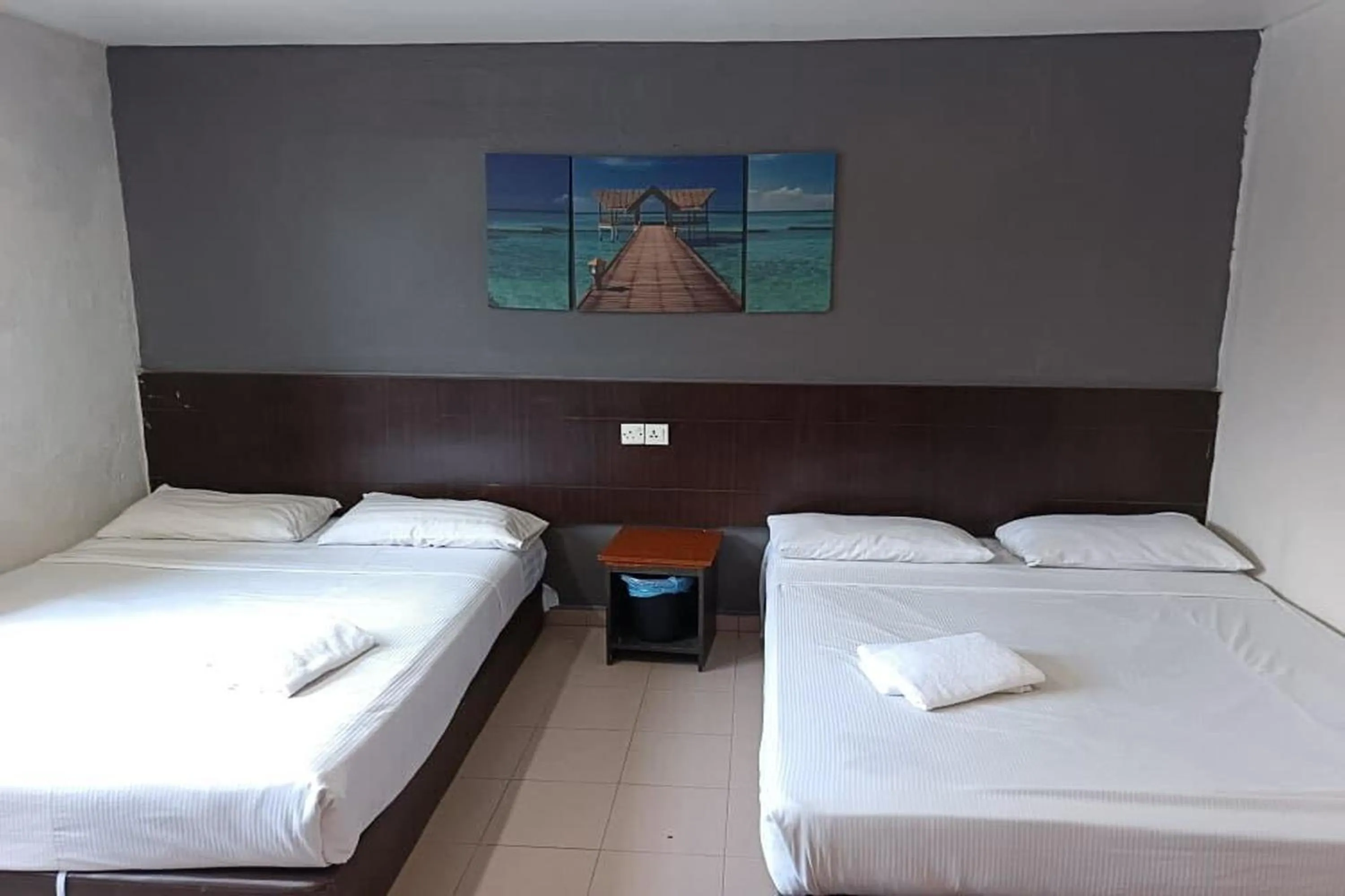 Bed in Tiong Nam Hotel