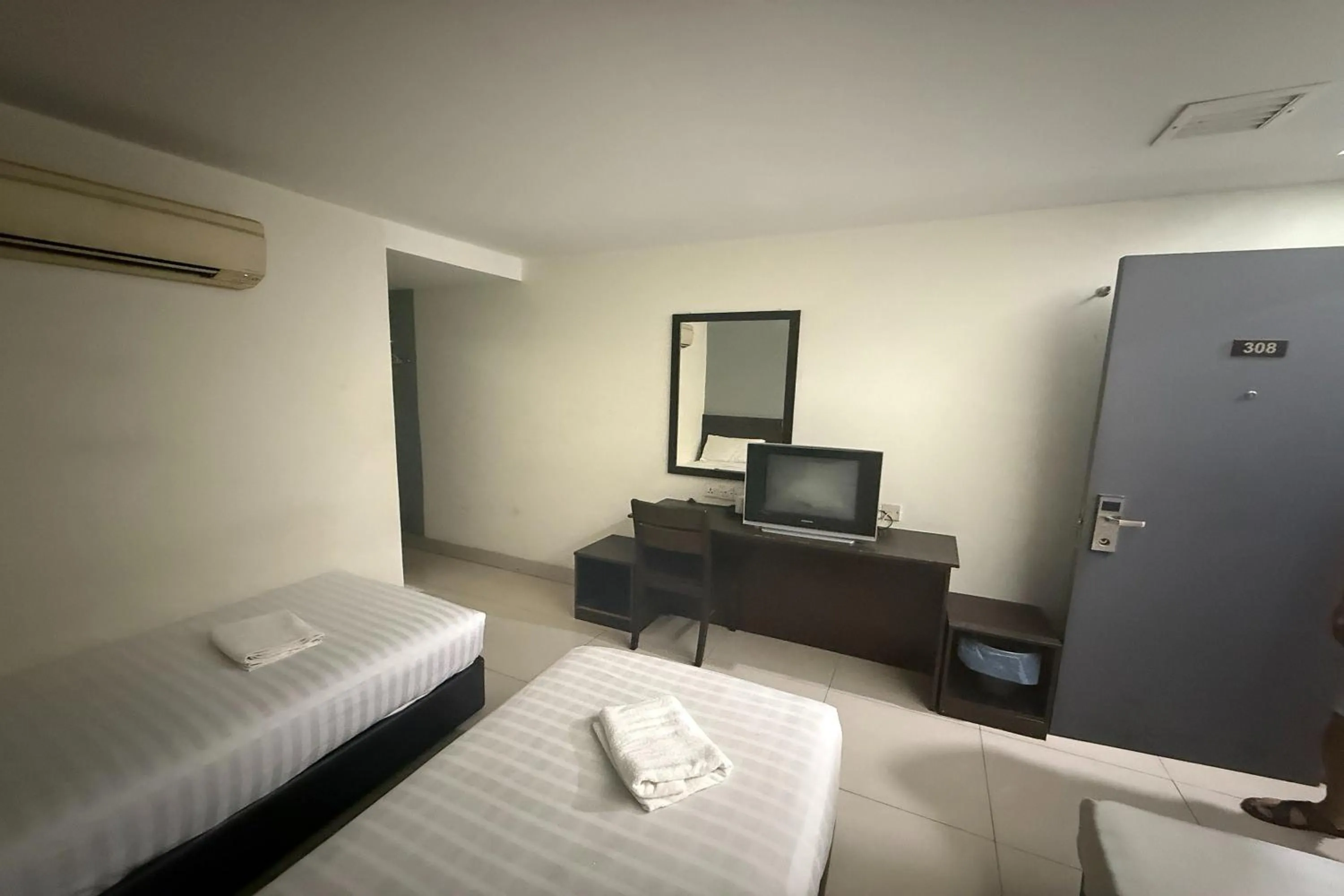 Bed in Tiong Nam Hotel