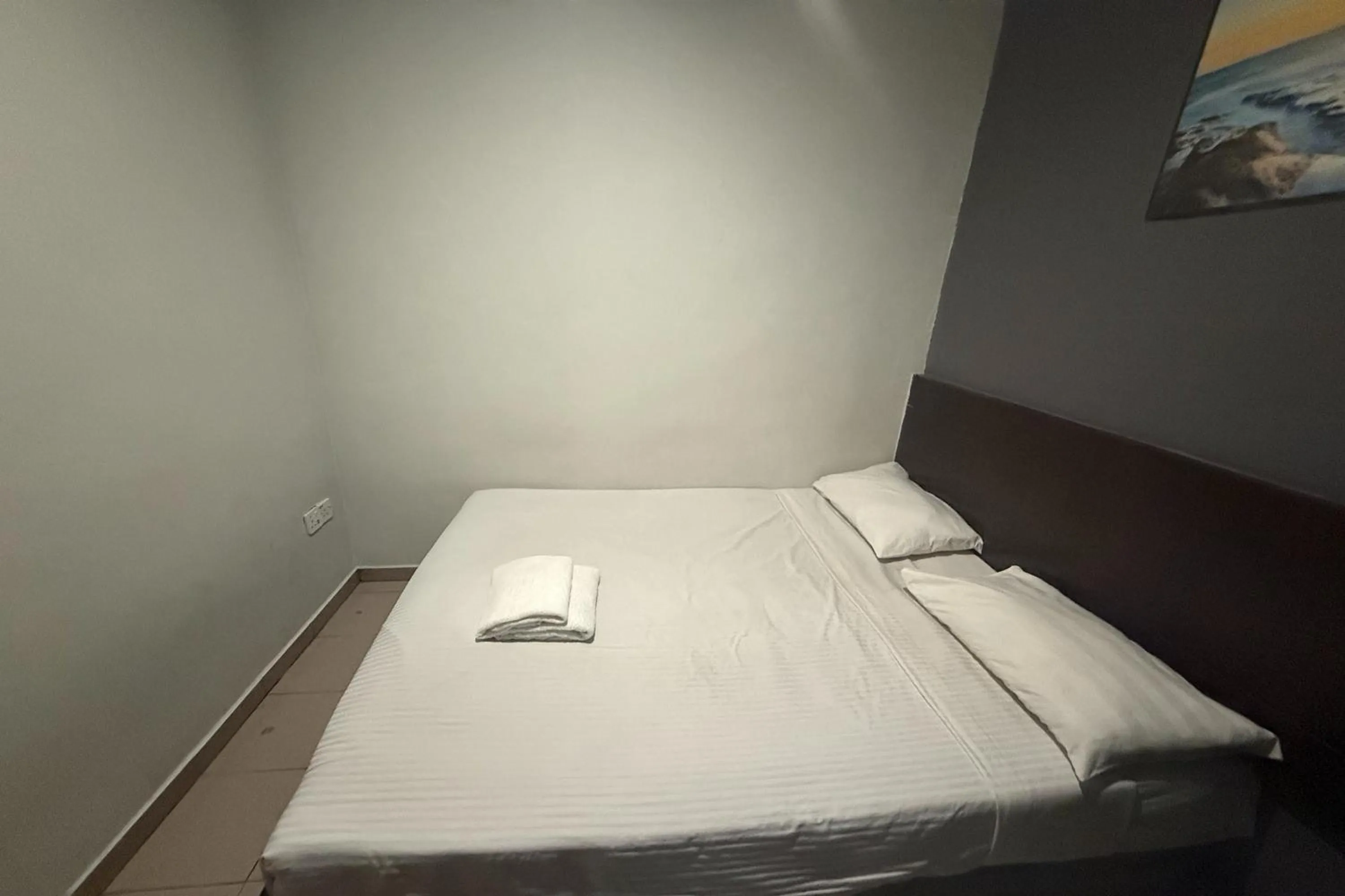 Bed in Tiong Nam Hotel