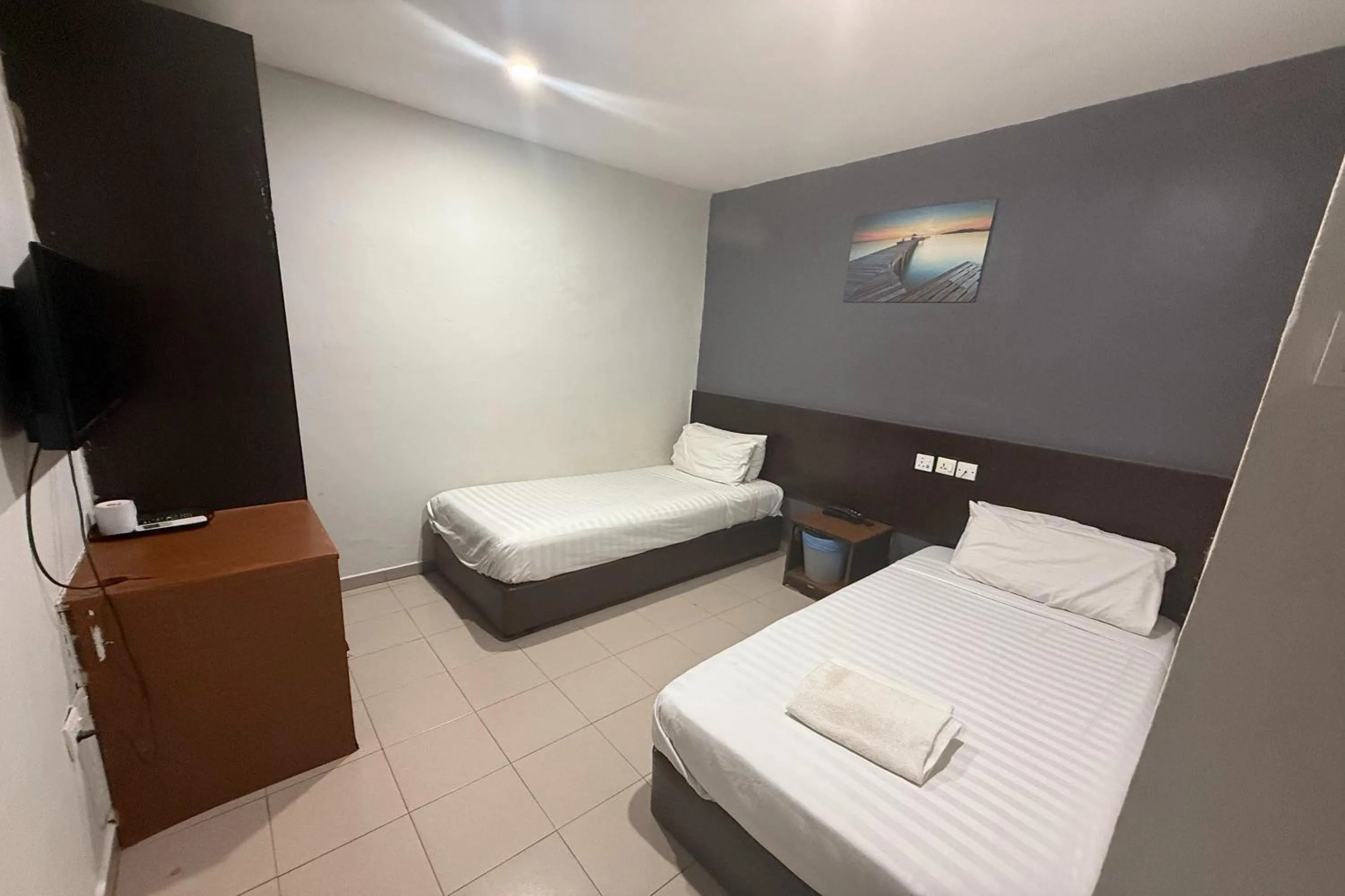 Bed in Tiong Nam Hotel