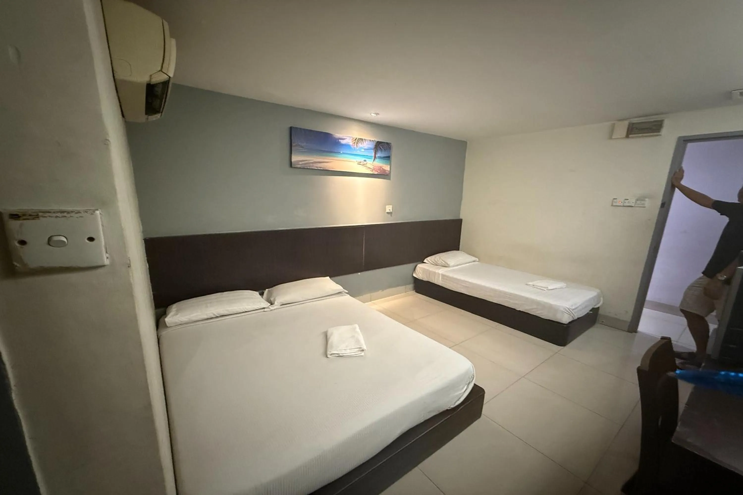 Bed in Tiong Nam Hotel