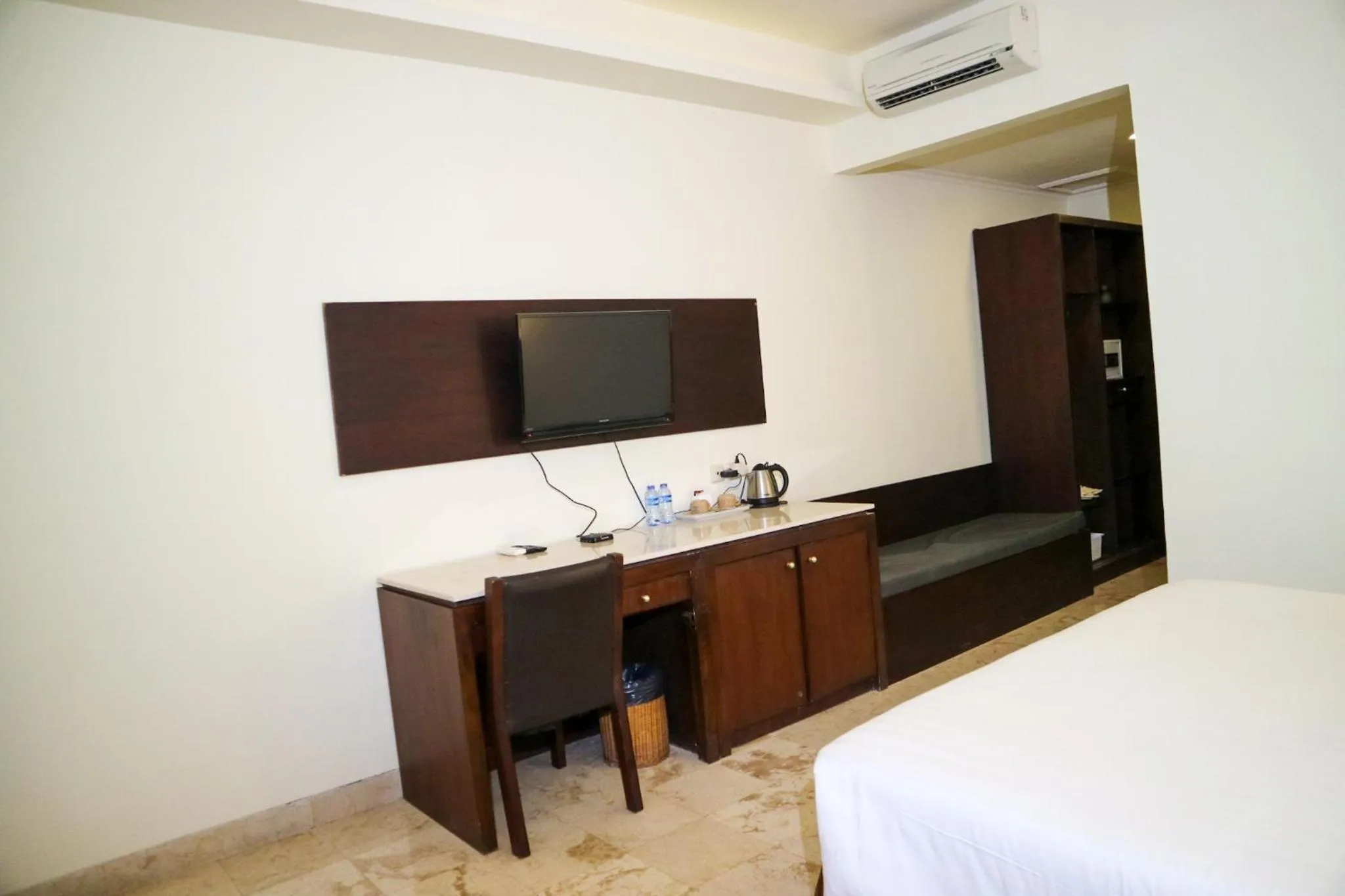 Bed in The Lagoon Bali Pool Hotel and Suites