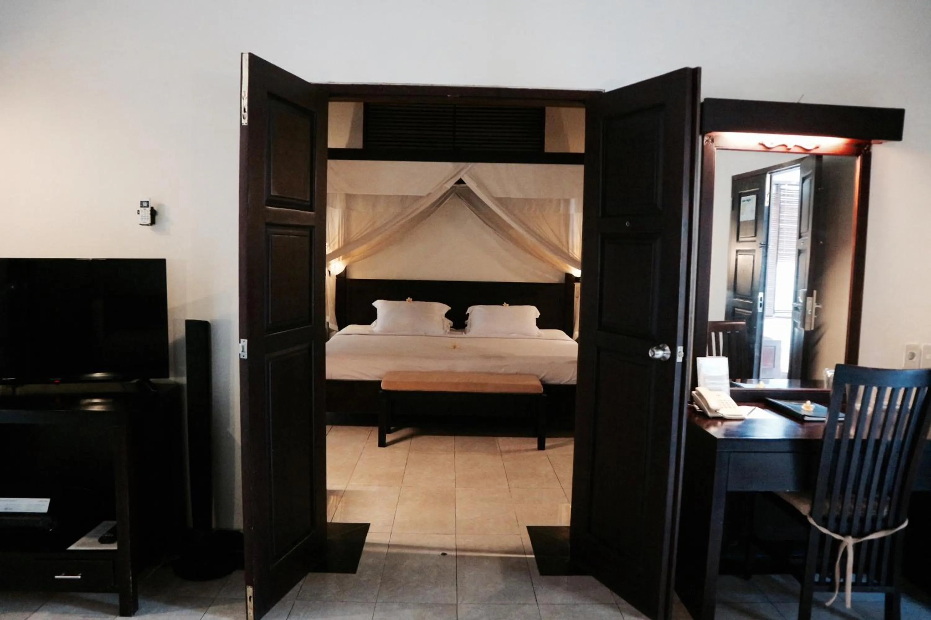 Bed in The Lagoon Bali Pool Hotel and Suites