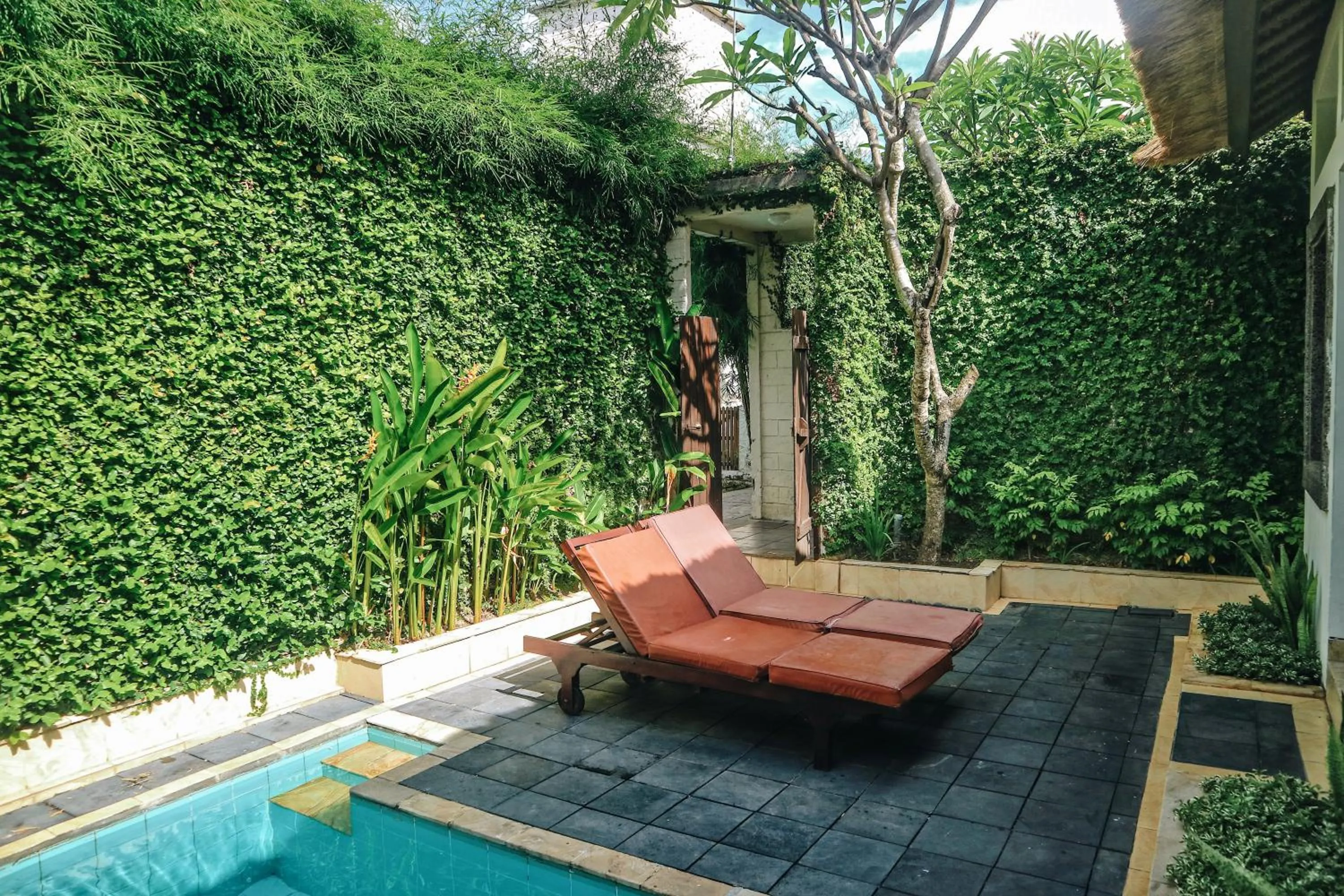 Swimming pool in The Lagoon Bali Pool Hotel and Suites