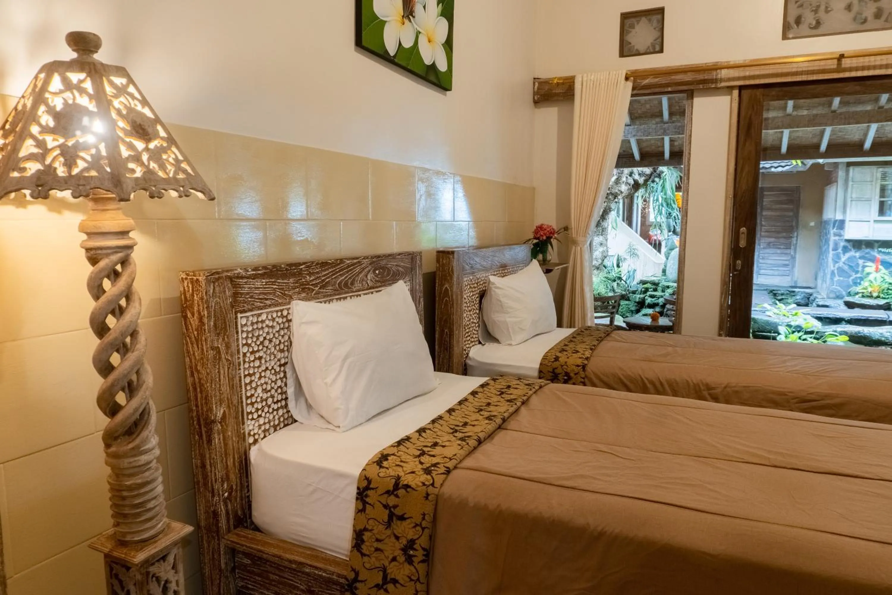 Bed in Uma Shanty Homestay