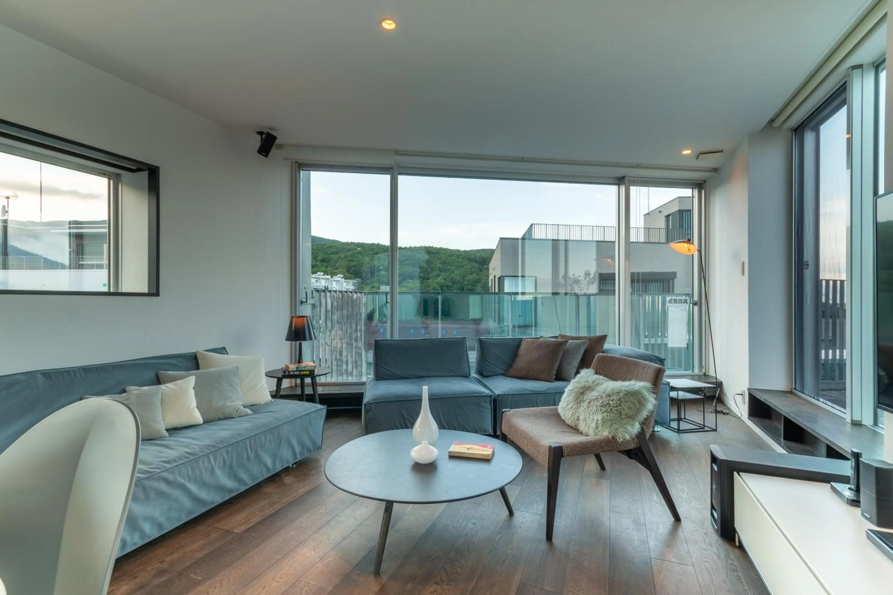 Living room in Kira Kira Suites by H2 Life