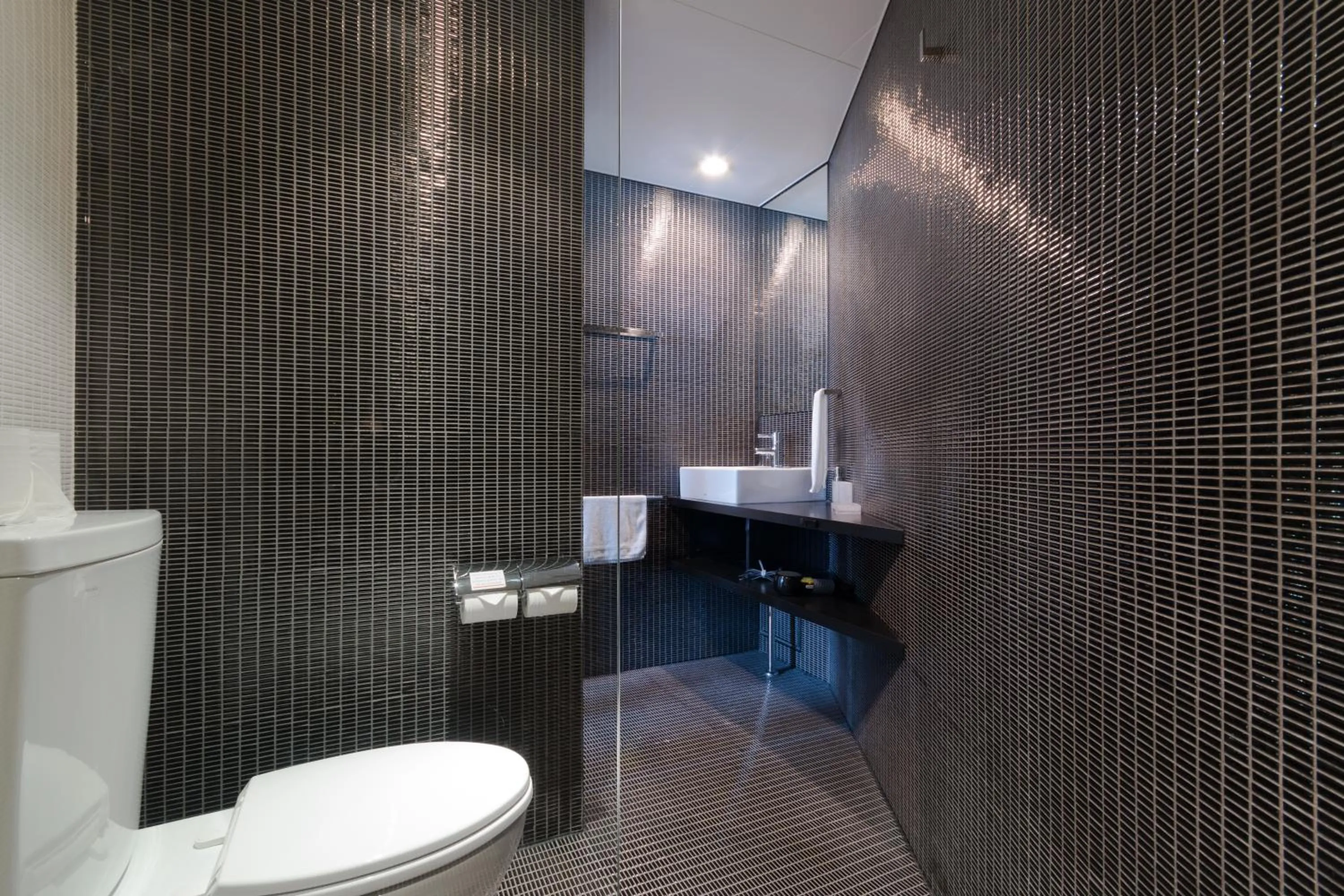 Bathroom in Kira Kira Suites by H2 Life
