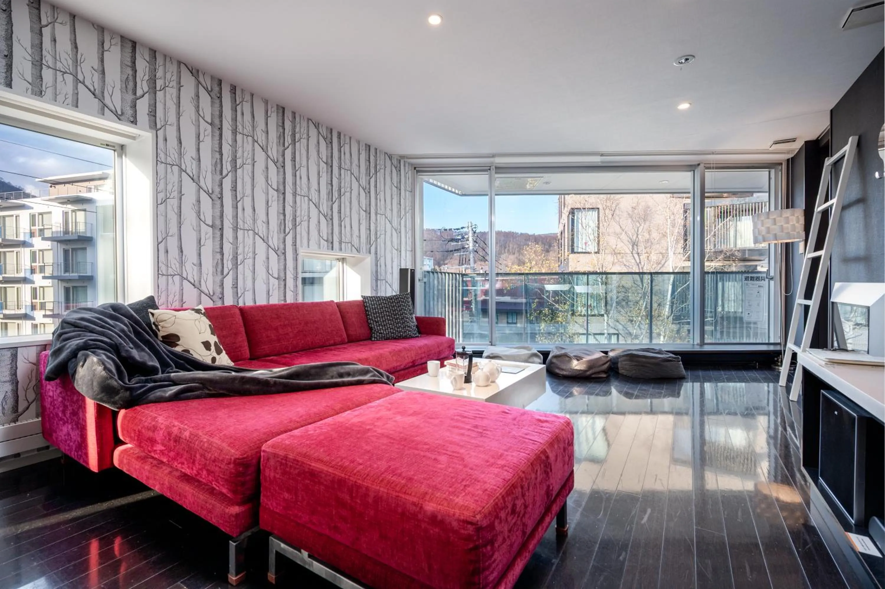 Living room, Bed in Kira Kira Suites by H2 Life