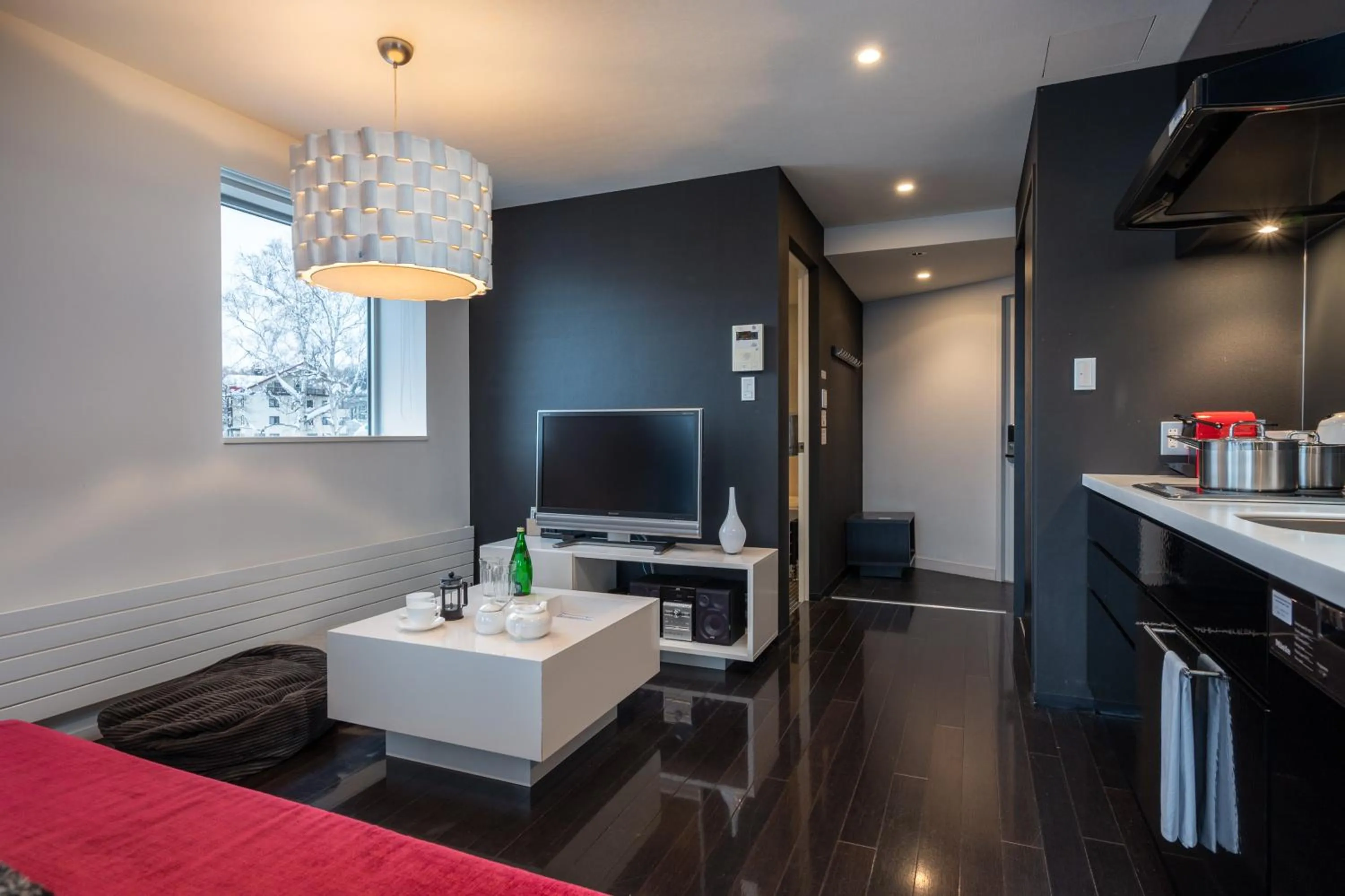 Seating area in Kira Kira Suites by H2 Life