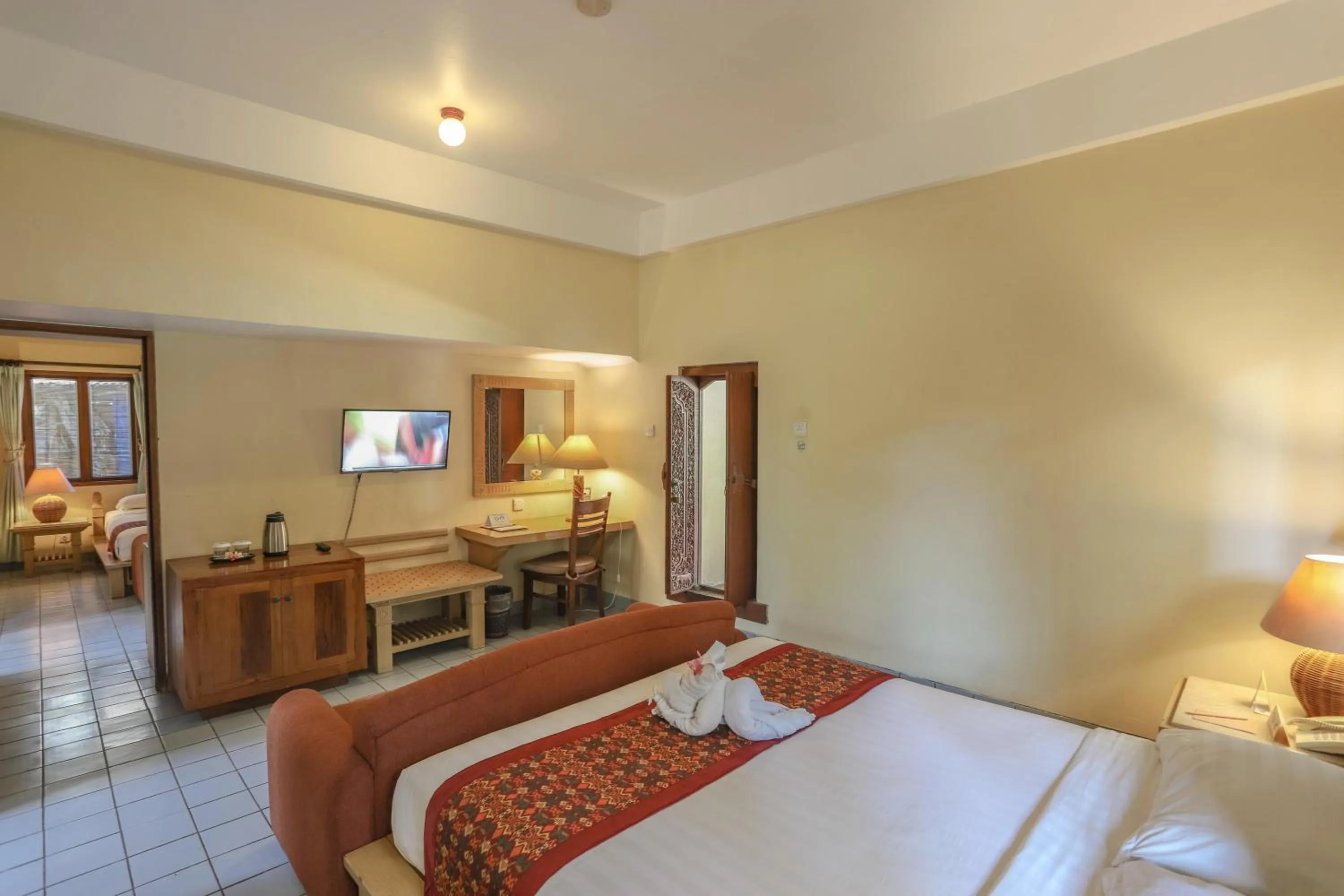 TV and multimedia, Bed in Sativa Sanur Cottages